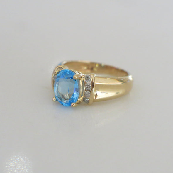 14K Yellow Gold Swiss Blue Topaz and Diamond Oval Ring – Size 6