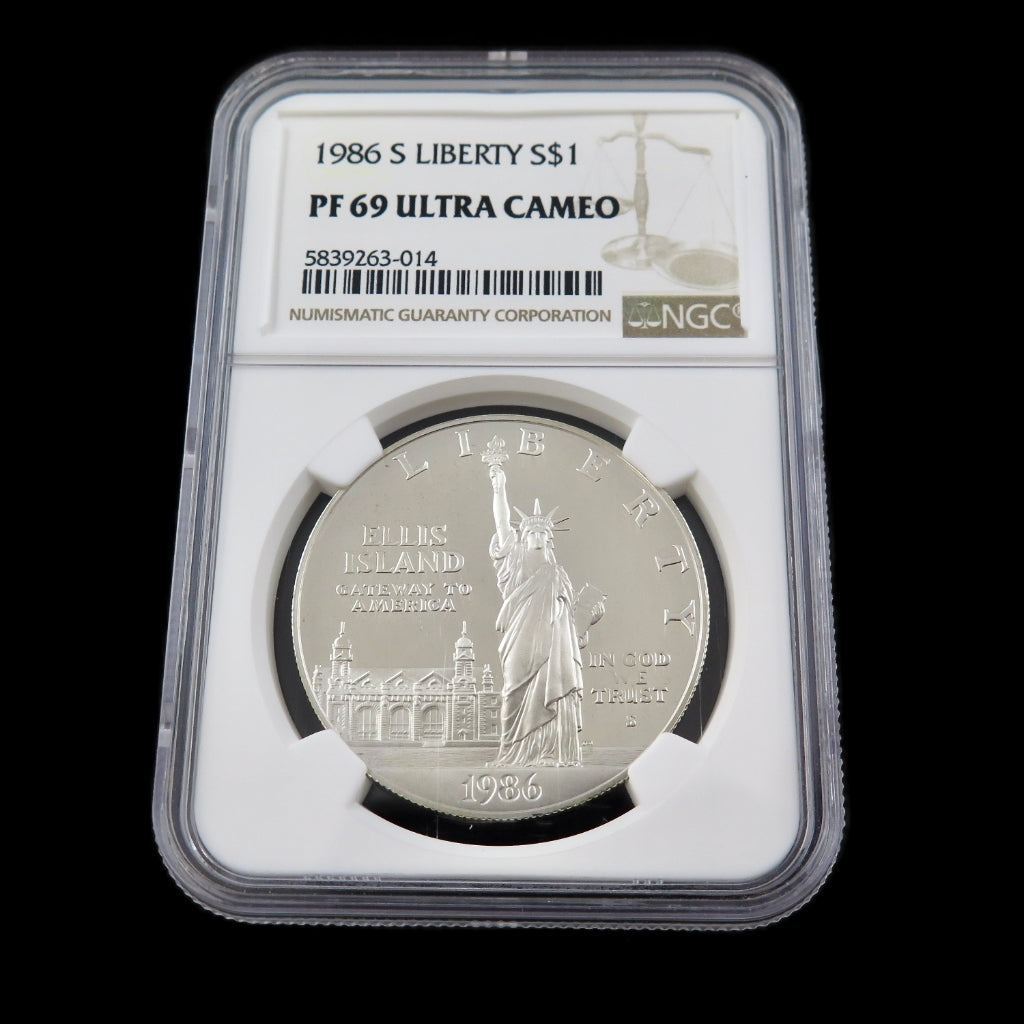 Silver dollar coin 1986-S Liberty Silver Dollar PF69 NGC Ultra Cameo commemorative coin showing detailed obverse and reverse design.