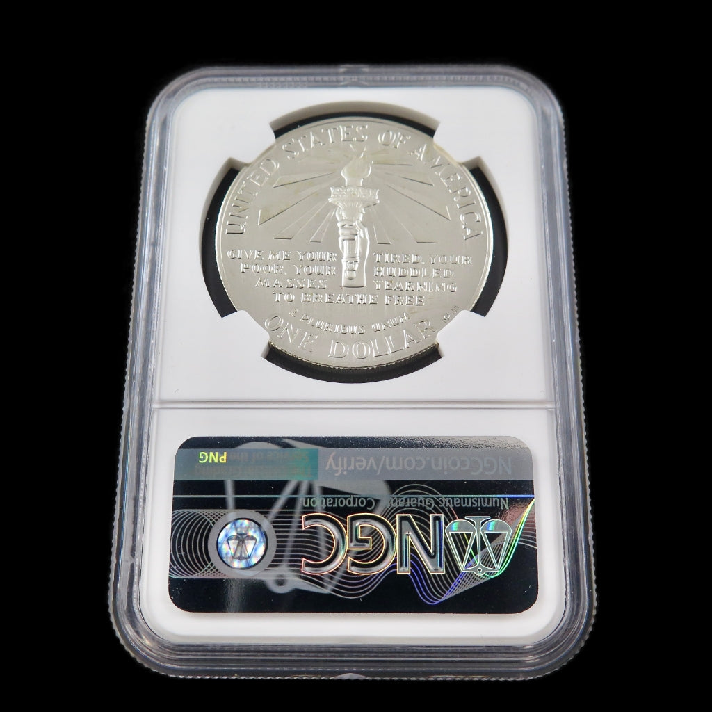 Silver dollar coin 1986-S Liberty commemorative, PF69 Ultra Cameo grade, NGC certified, featuring detailed coin design.