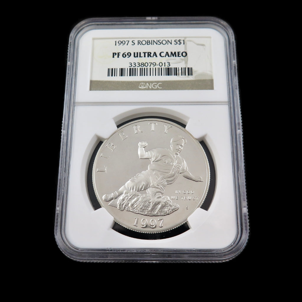 Silver dollar commemorative coin featuring Jackie Robinson, 1997-S PF69 NGC Ultra Cameo, showcasing detailed design and reflective surface.