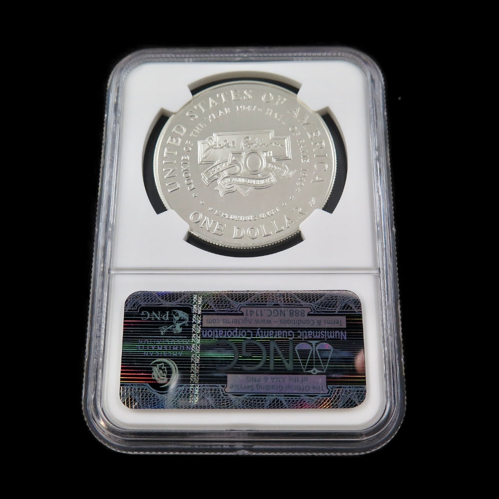 Silver dollar coin featuring Jackie Robinson, 1997-S commemorative, graded PF69 Ultra Cameo by NGC, showcasing detailed design.