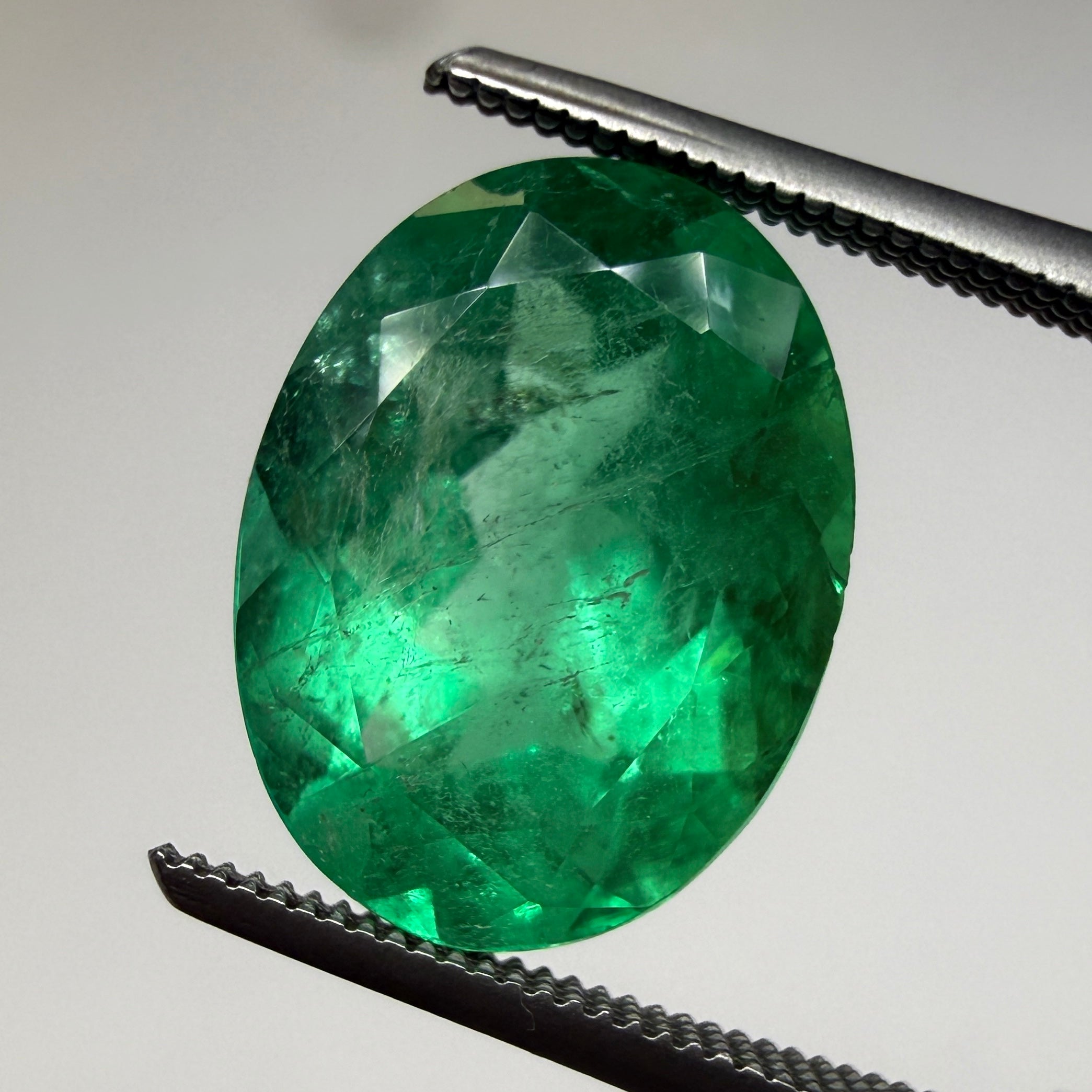 GIA Certified Emerald 2.45ct Oval Green Beryl, F1 Minor Enhancement, 10.54 x 7.94mm