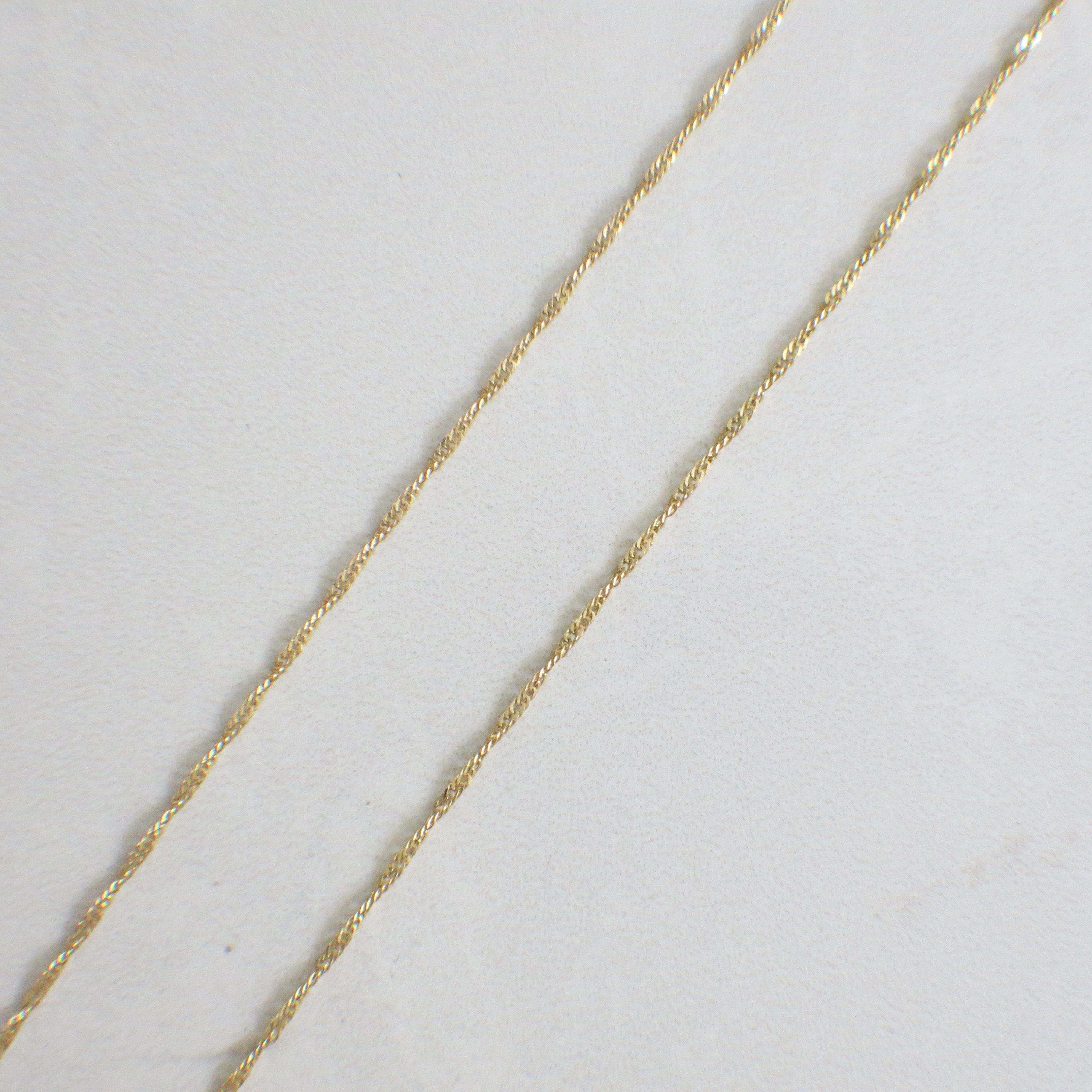 14K Yellow Gold Singapore Chain Necklace – 18", 1.1 mm - Black Market LLC