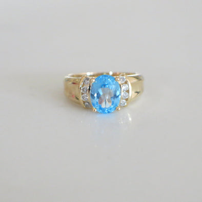 14K Yellow Gold Swiss Blue Topaz and Diamond Oval Ring – Size 6