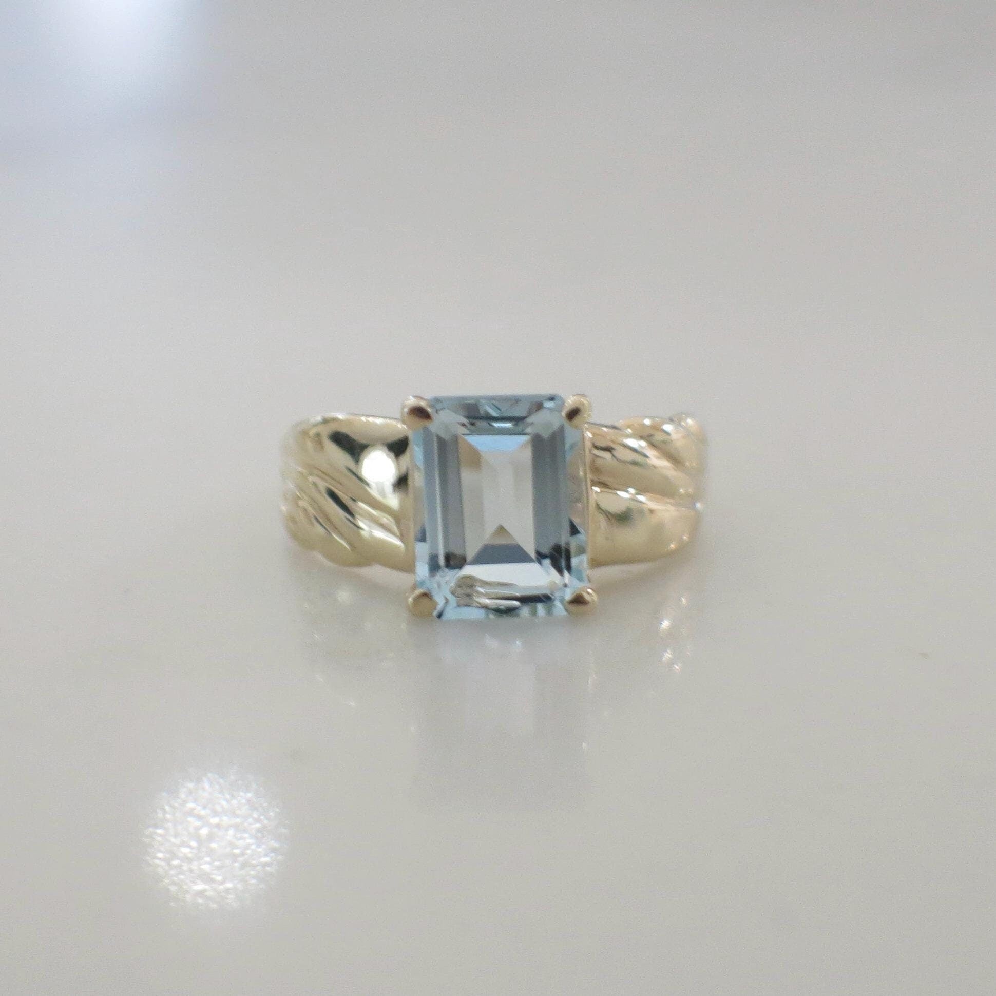 Emerald Cut Sky Blue Topaz Solitaire Ring – 10K Yellow Gold, Size 6.75 - Black Market LLC