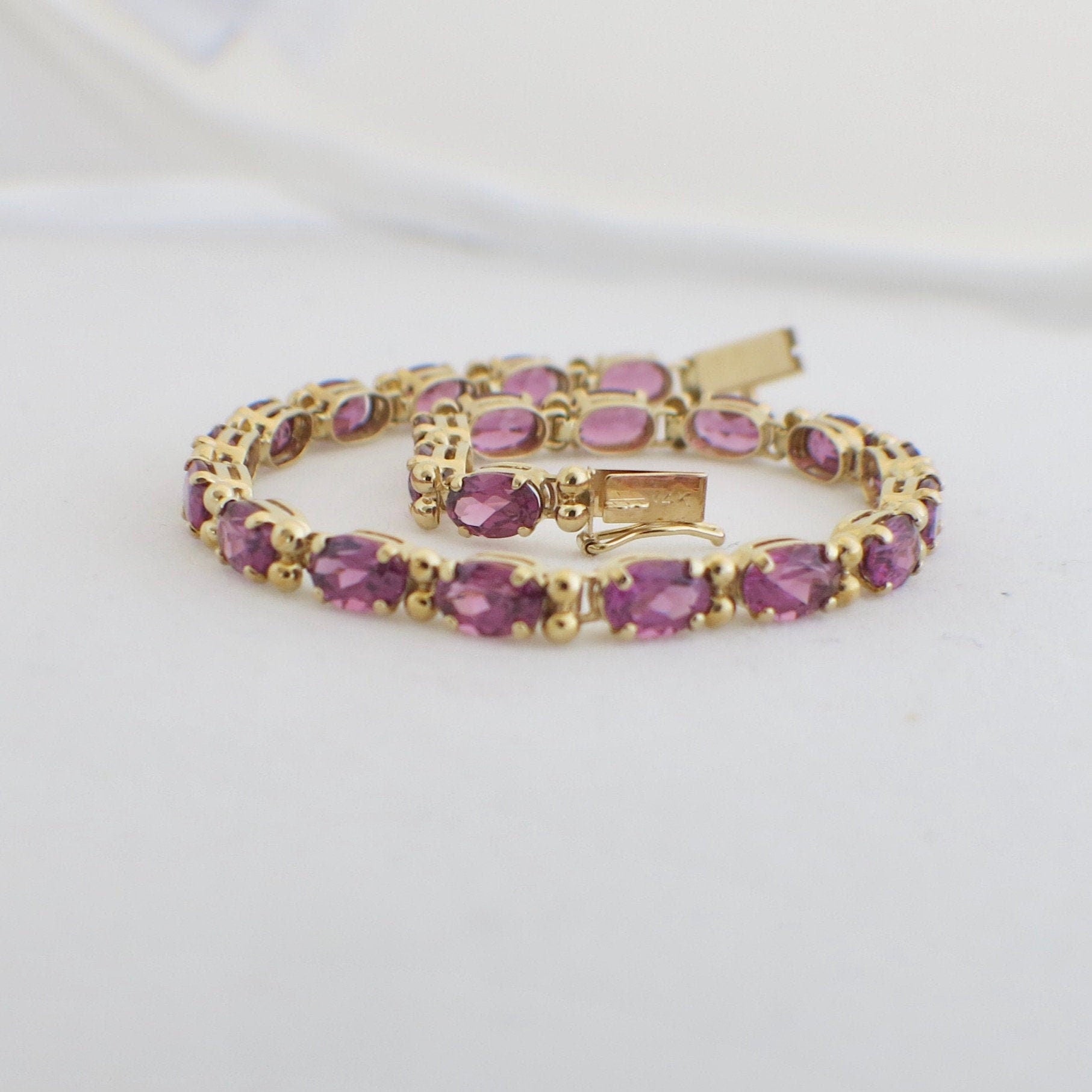14K Yellow Gold Rhodolite Garnet Tennis Bracelet – Oval East-West Set, 7.25" - Black Market LLC