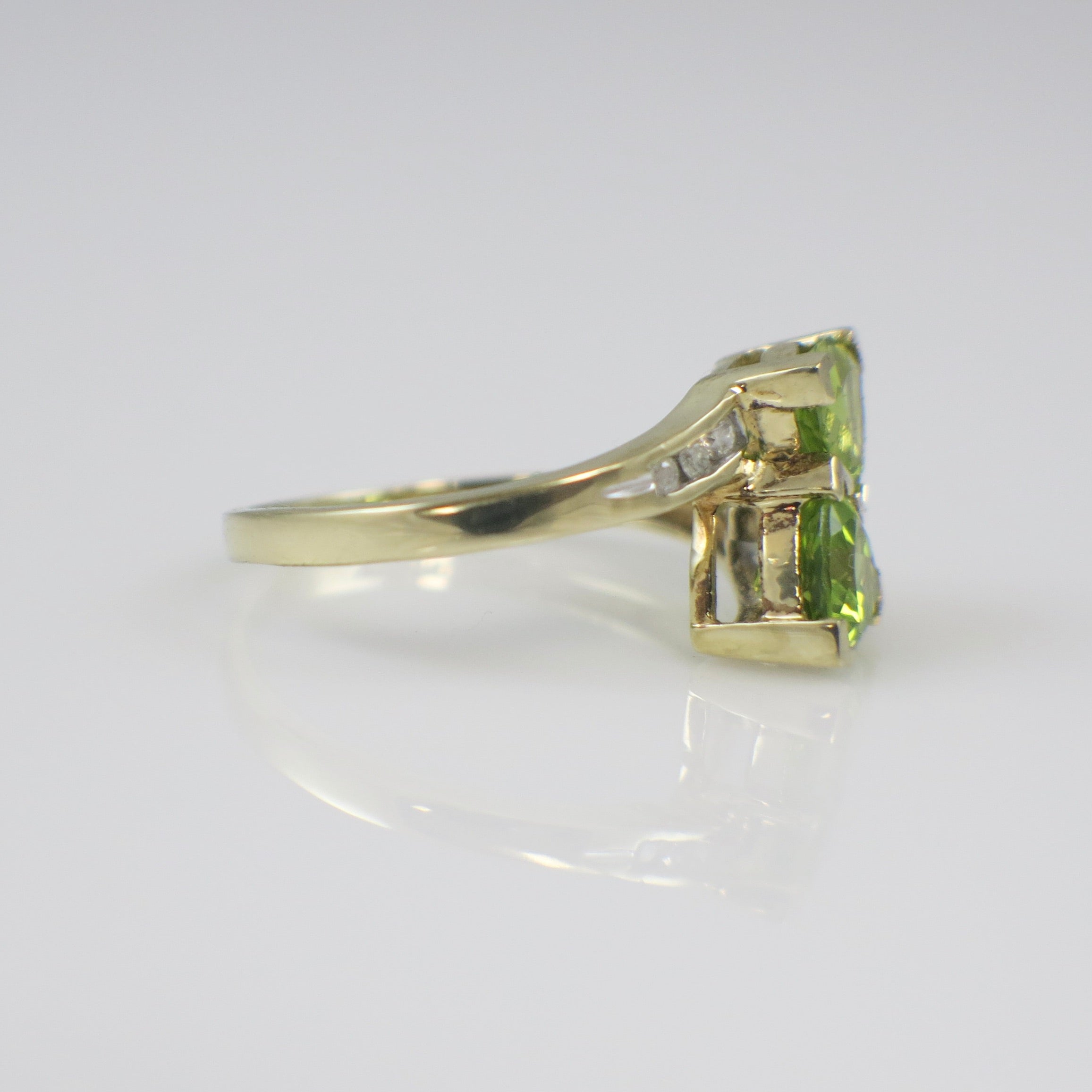 10K Yellow Gold Peridot Ring – Trillion Cut Bypass Ring with Diamond Accents