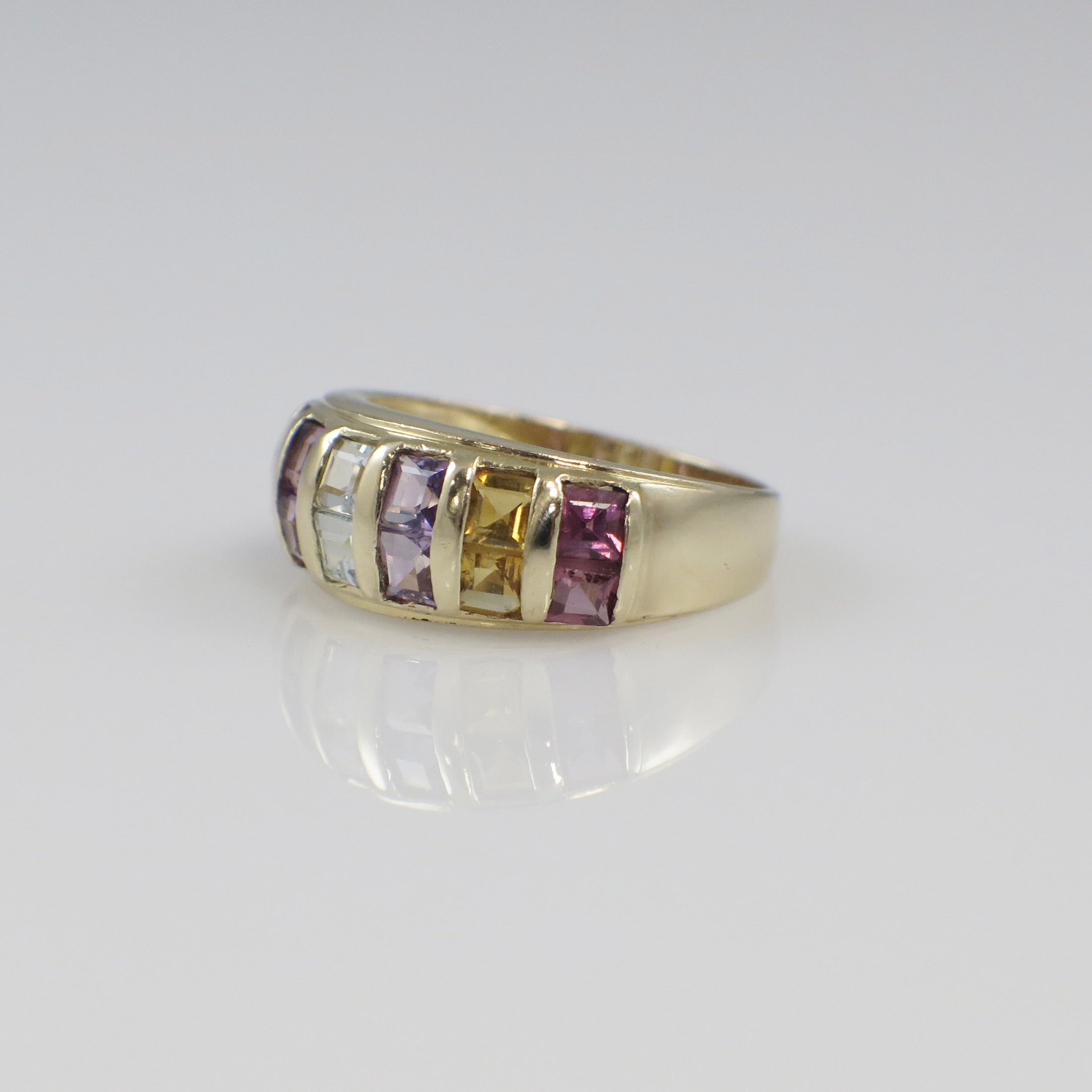 Vintage 14K yellow gold multi-gemstone princess cut ring with colorful gemstones, crafted by Black Market LLC.