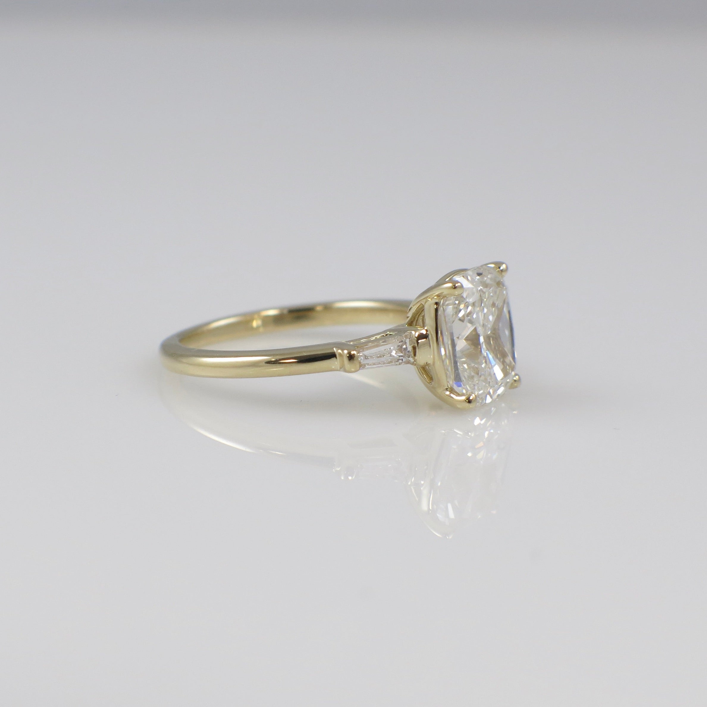 Custom 2.90 CTW Lab Grown Elongated Cushion Diamond Three Stone Engagement Ring in 14K Yellow Gold