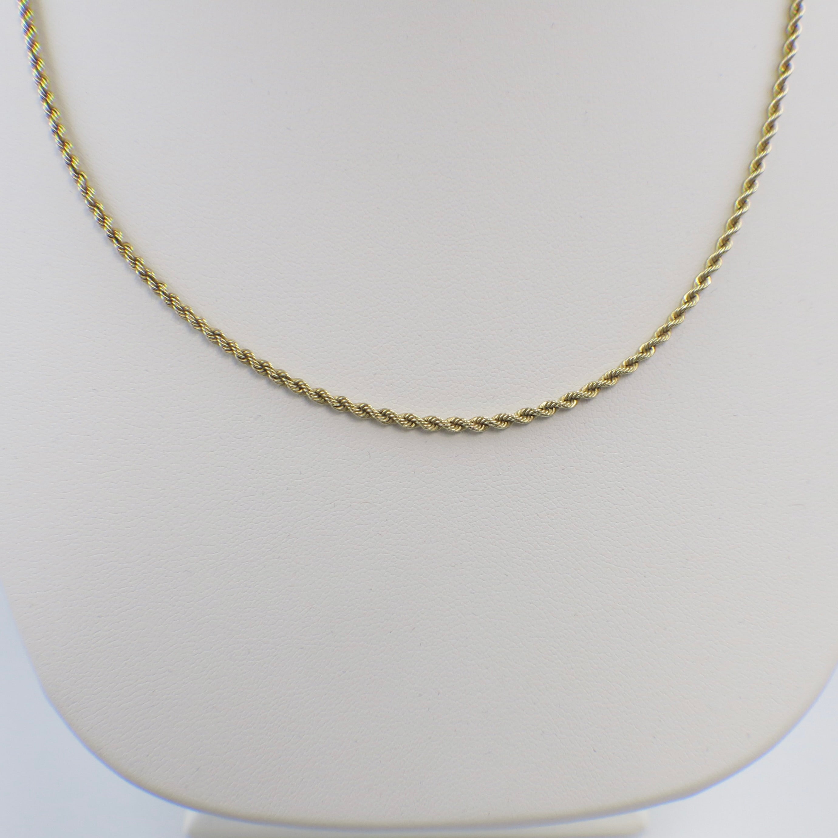14K yellow gold 24-inch 2mm rope chain necklace with a solid gold finish, featuring a detailed twisted rope design.