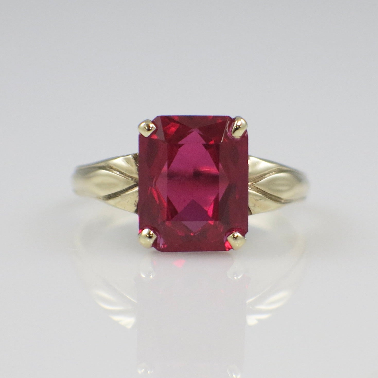 10K Yellow Gold Emerald Cut Synthetic Ruby Statement Ring – Size 5.25