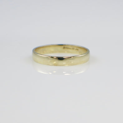 Gold ring on a white background