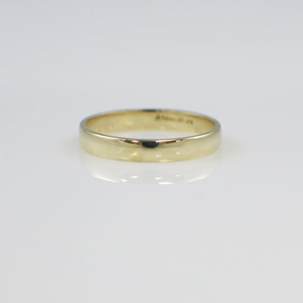 Gold ring on a white background