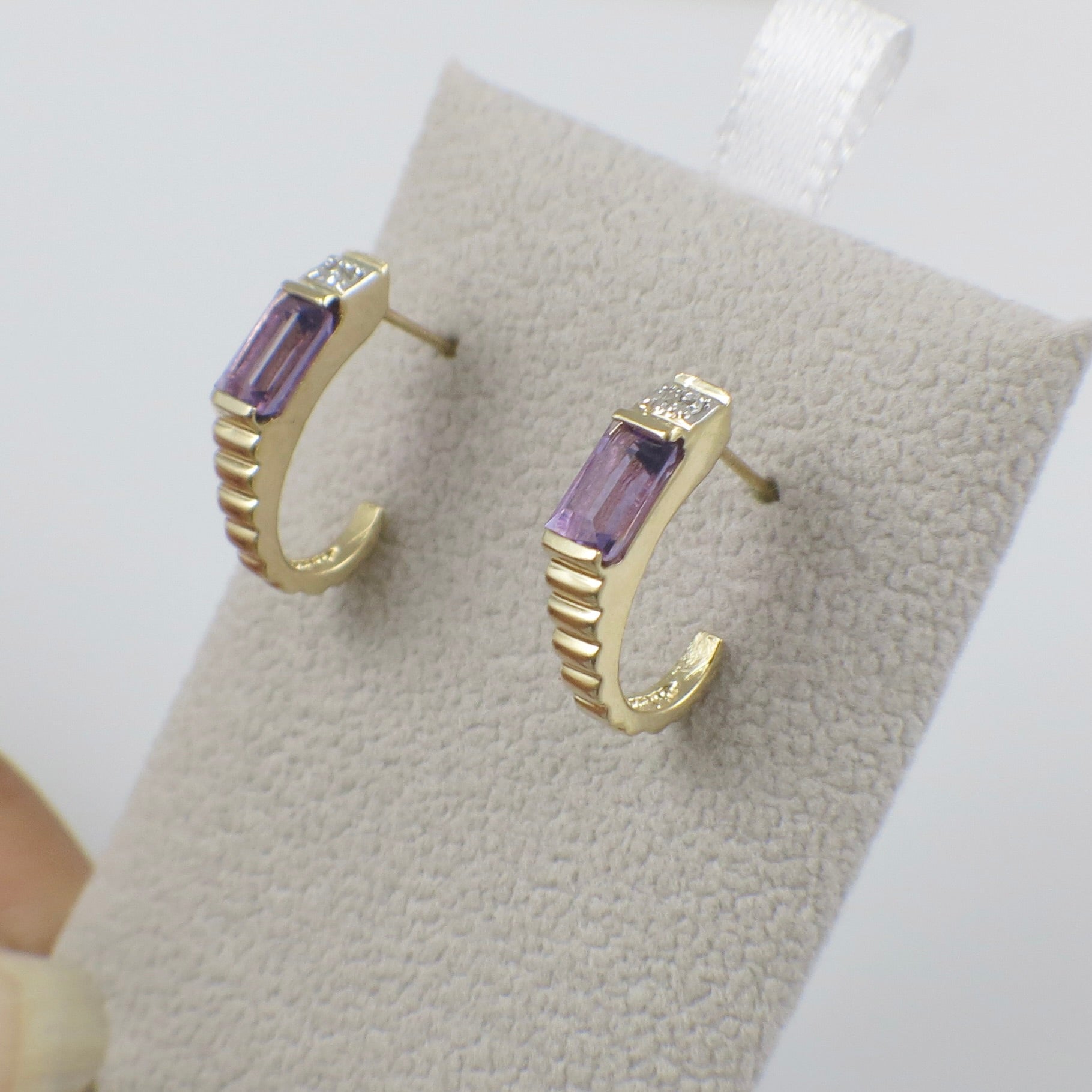 Vintage 14K yellow gold amethyst and diamond J hoop earrings with intricate detailing.