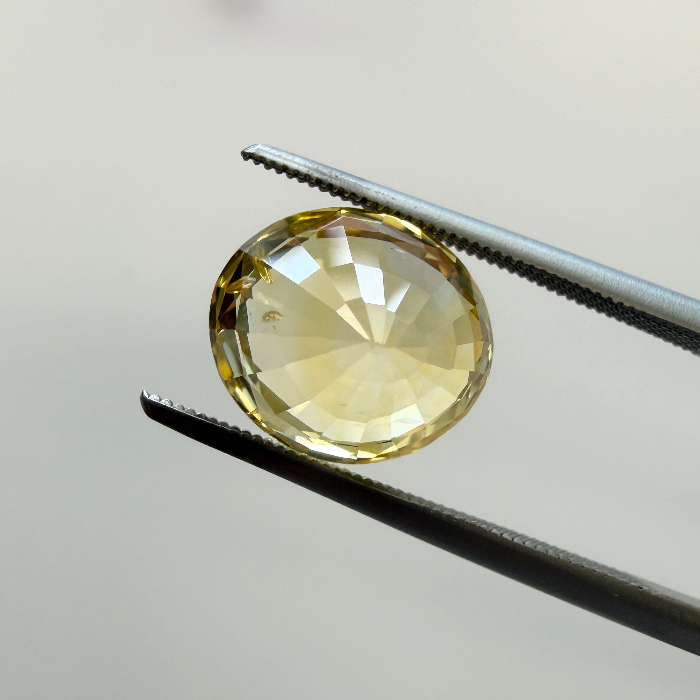 Oval GIA Yellow Sapphire gemstone, 4.10ct heated natural sapphire with vibrant yellow color, from Black Market LLC.