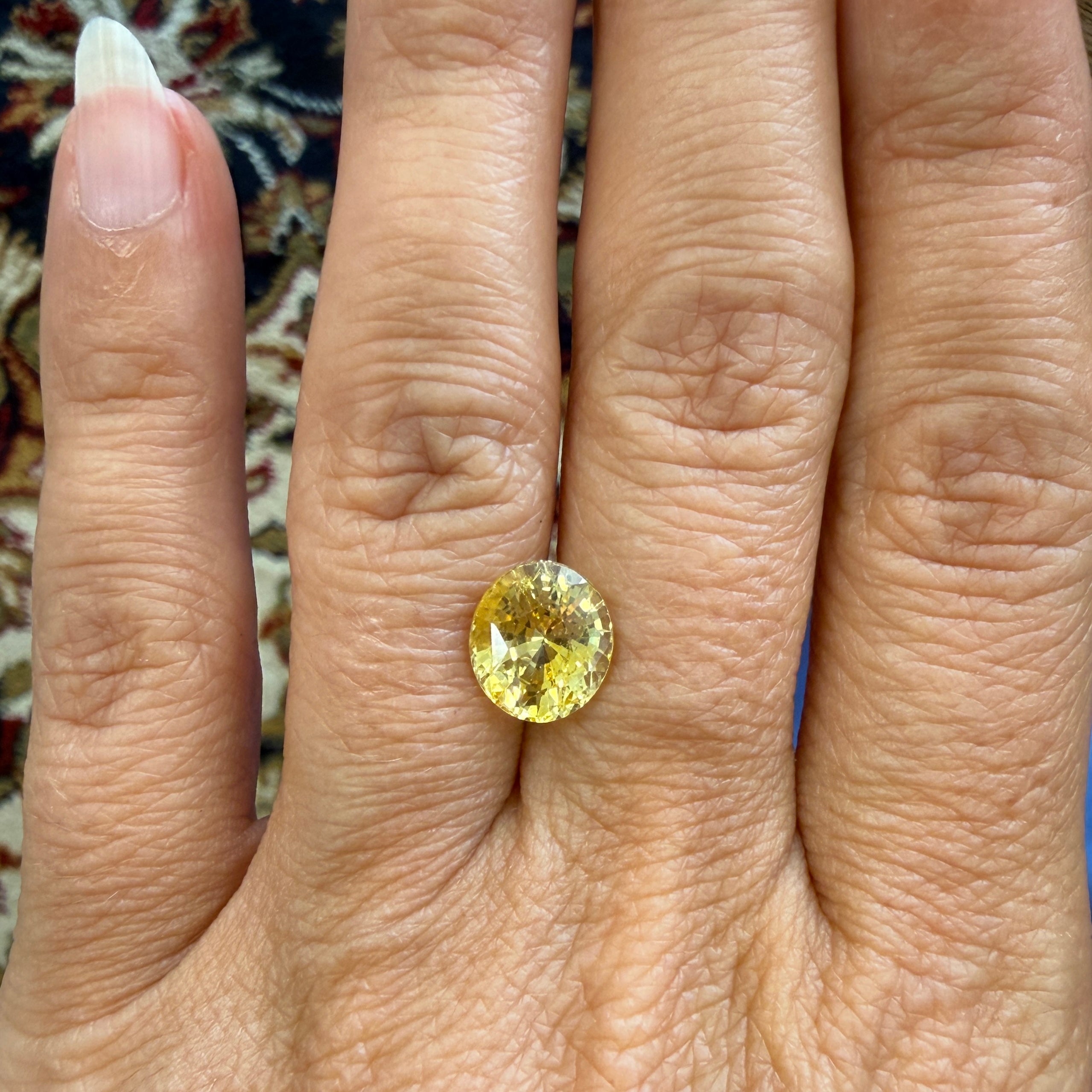 Oval GIA Yellow Sapphire gemstone, 4.10ct heated natural yellow sapphire, 9.77 x 8.56mm, from Black Market LLC.