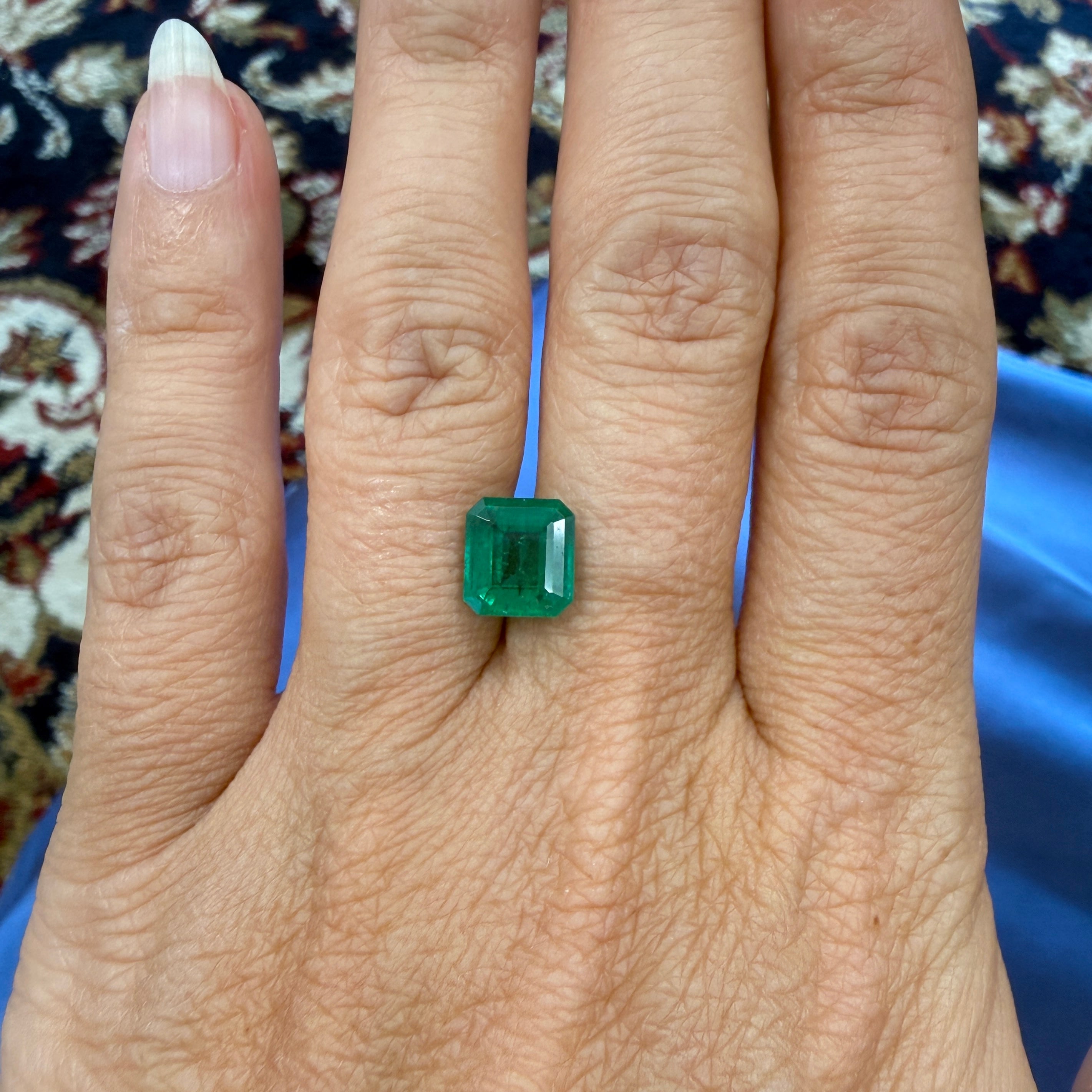 GIA Certified emerald gemstone, 2.43ct octagonal step cut, minor enhancement, measuring 8.44x7.85mm, from Black Market LLC