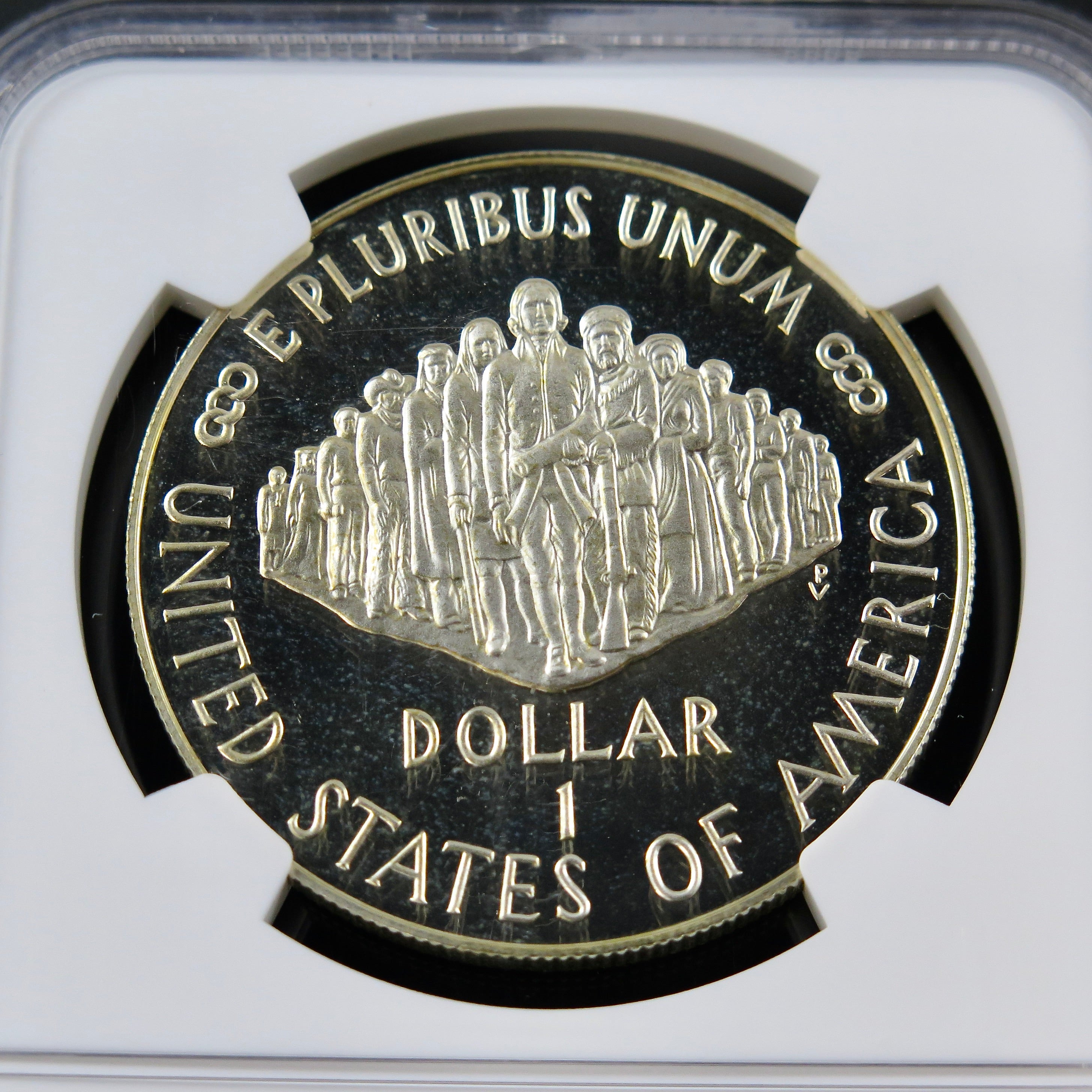 Silver dollar coin, 1987-S Constitution Commemorative, PF69 Ultra Cameo grade, displayed with detailed design features.