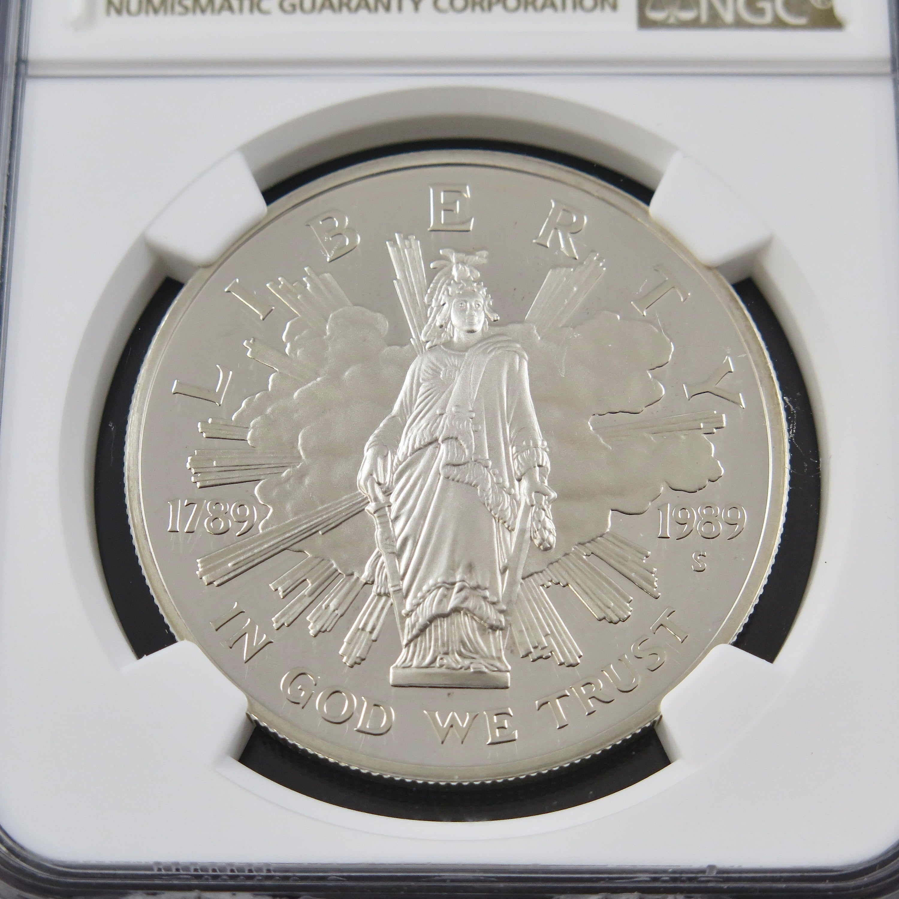 Silver Dollar coin featuring the 1989-S Congress commemorative design in Ultra Cameo finish, graded PF69 by NGC.