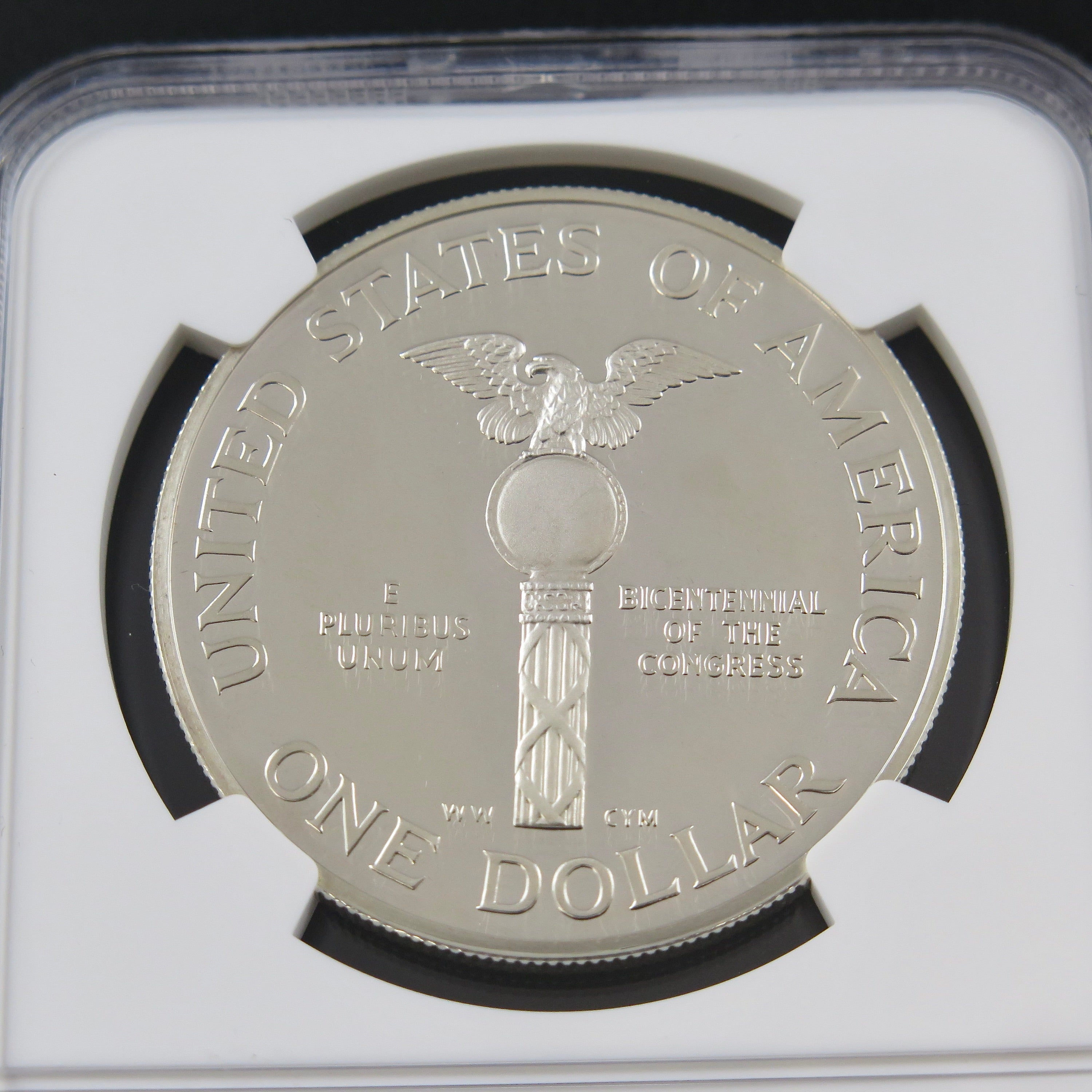 Silver dollar coin featuring the 1989-S Congress Silver Dollar commemorative with Ultra Cameo finish, graded PF69 by NGC.