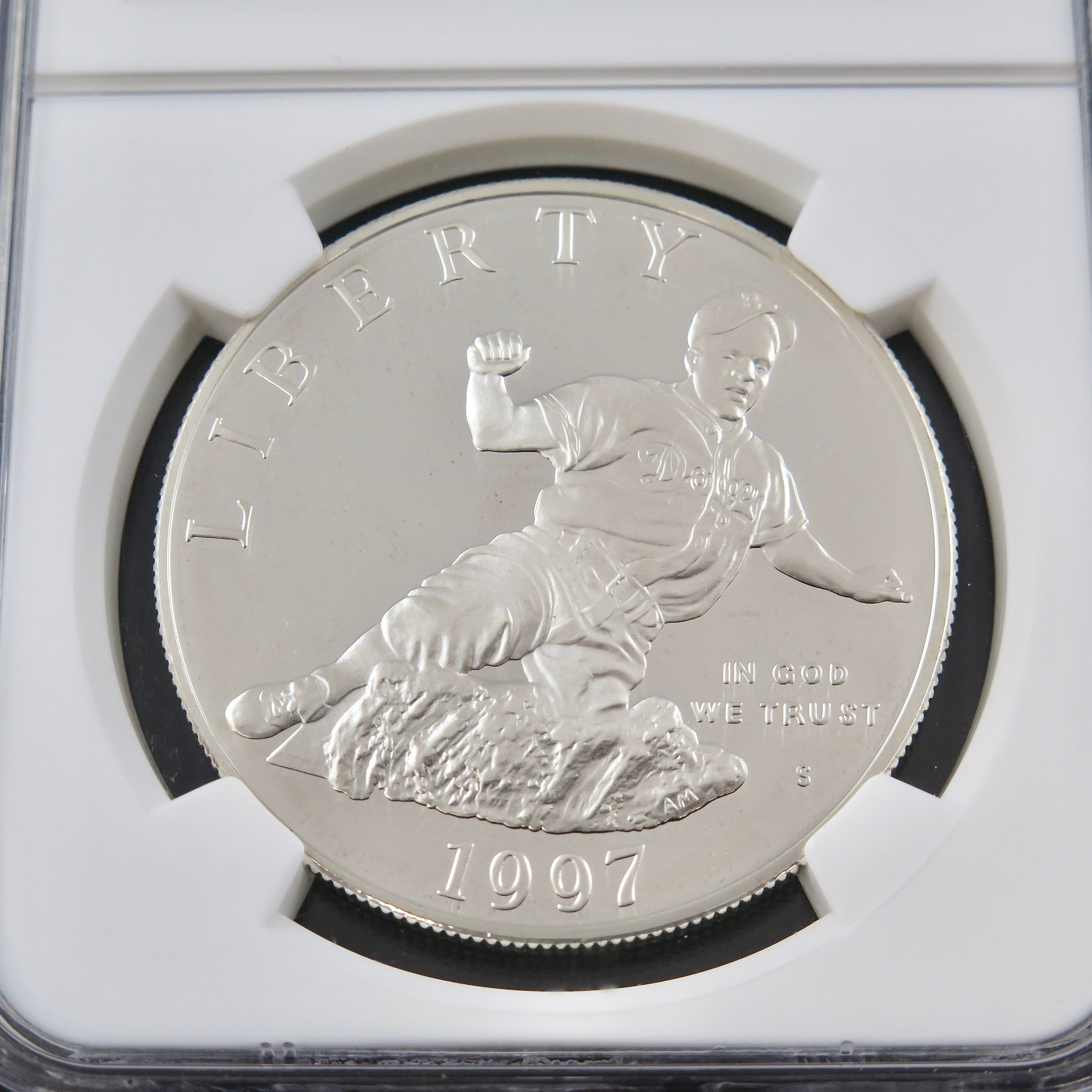 Silver Jackie Robinson 1997-S commemorative dollar coin in PF69 Ultra Cameo grade, showcasing detailed design and silver finish.