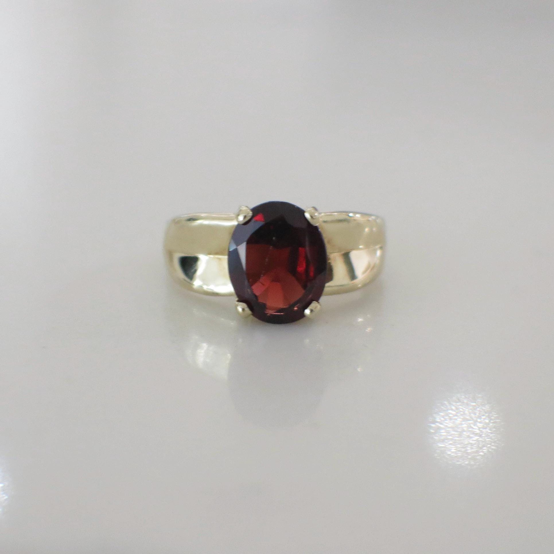 14K Yellow Gold Garnet Solitaire Ring – Oval Red January Birthstone - Black Market LLC