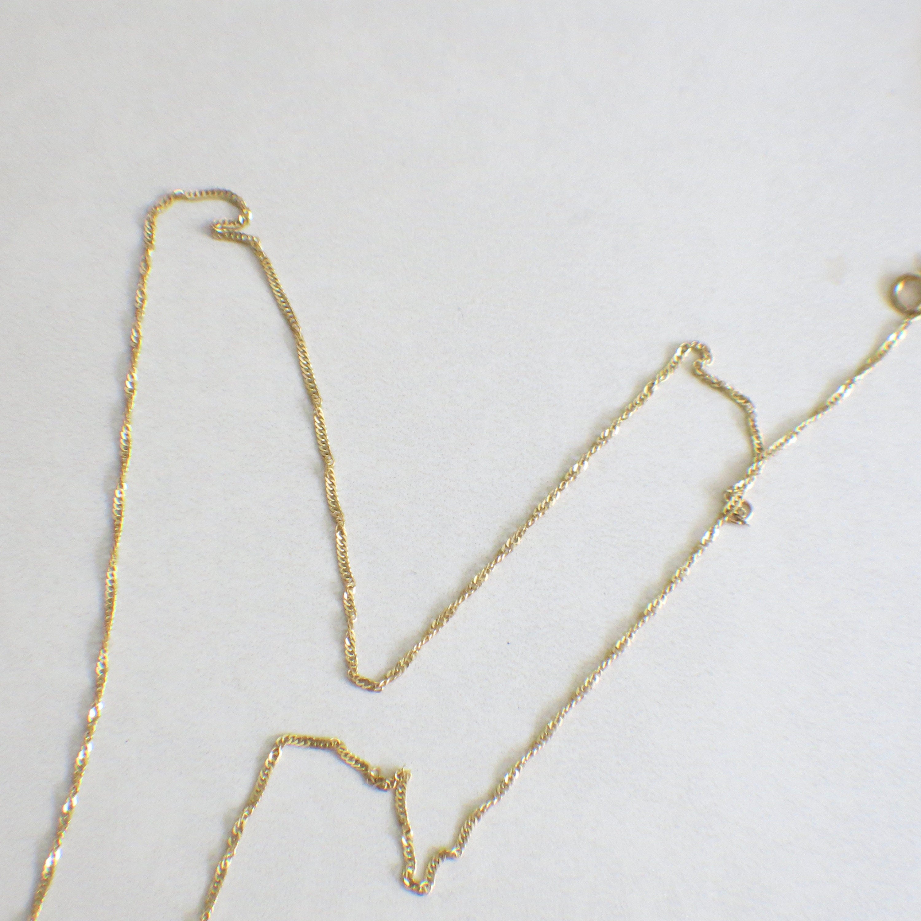 14K Yellow Gold Singapore Chain Necklace – 18", 1.1 mm - Black Market LLC