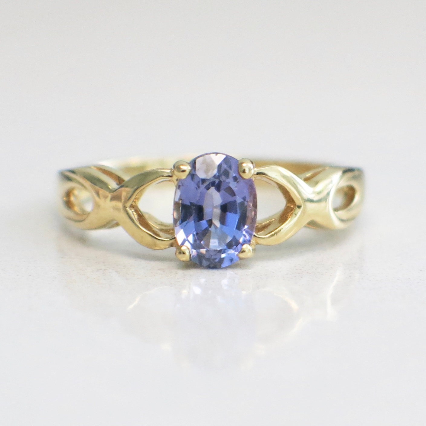 14K Yellow Gold Tanzanite Oval Ring – Infinity Twist Band, December Birthstone, Size 8.5 - Black Market LLC