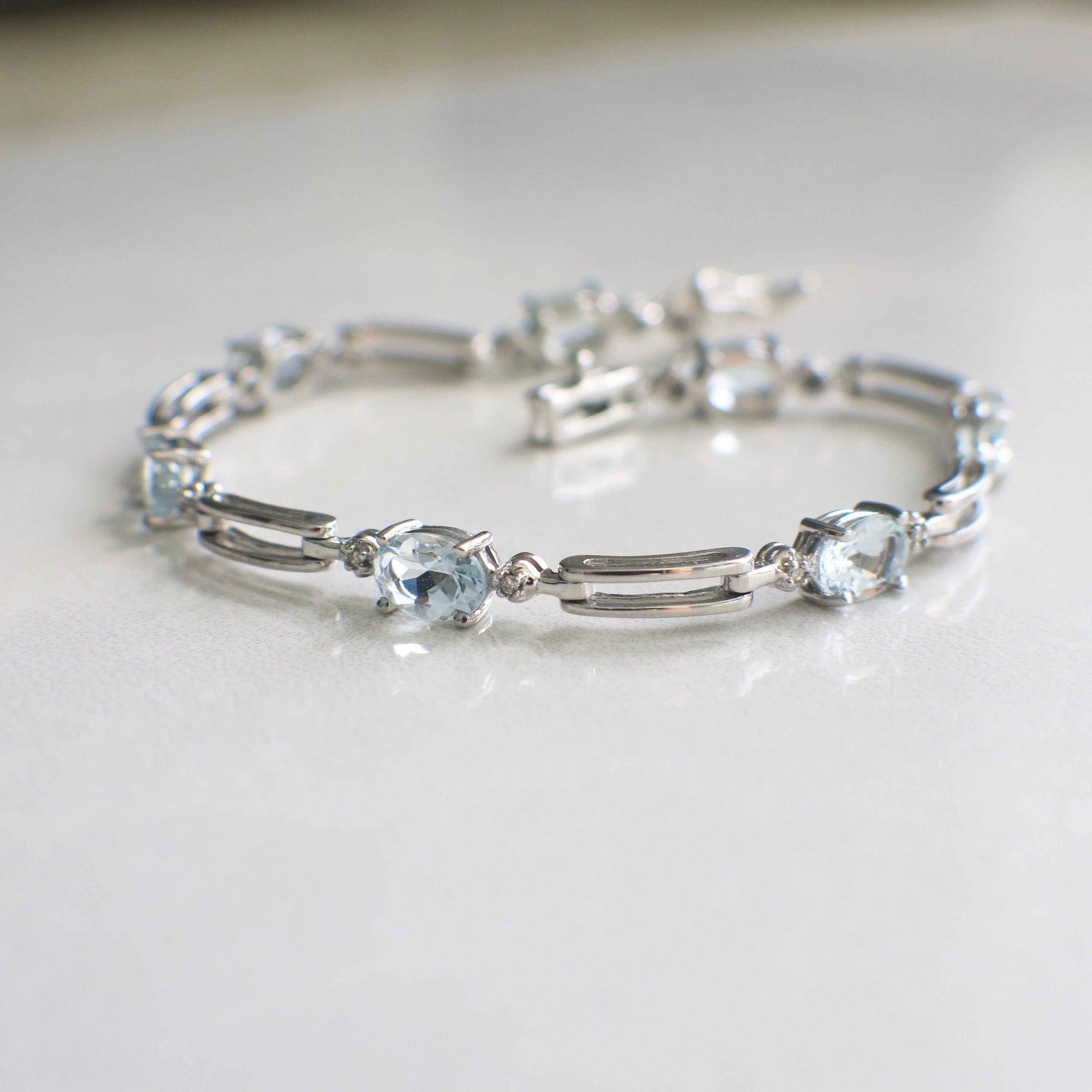 10K White Gold Light Blue Glass & Diamond Link Bracelet – 7 Inch Oval Stones - Black Market LLC