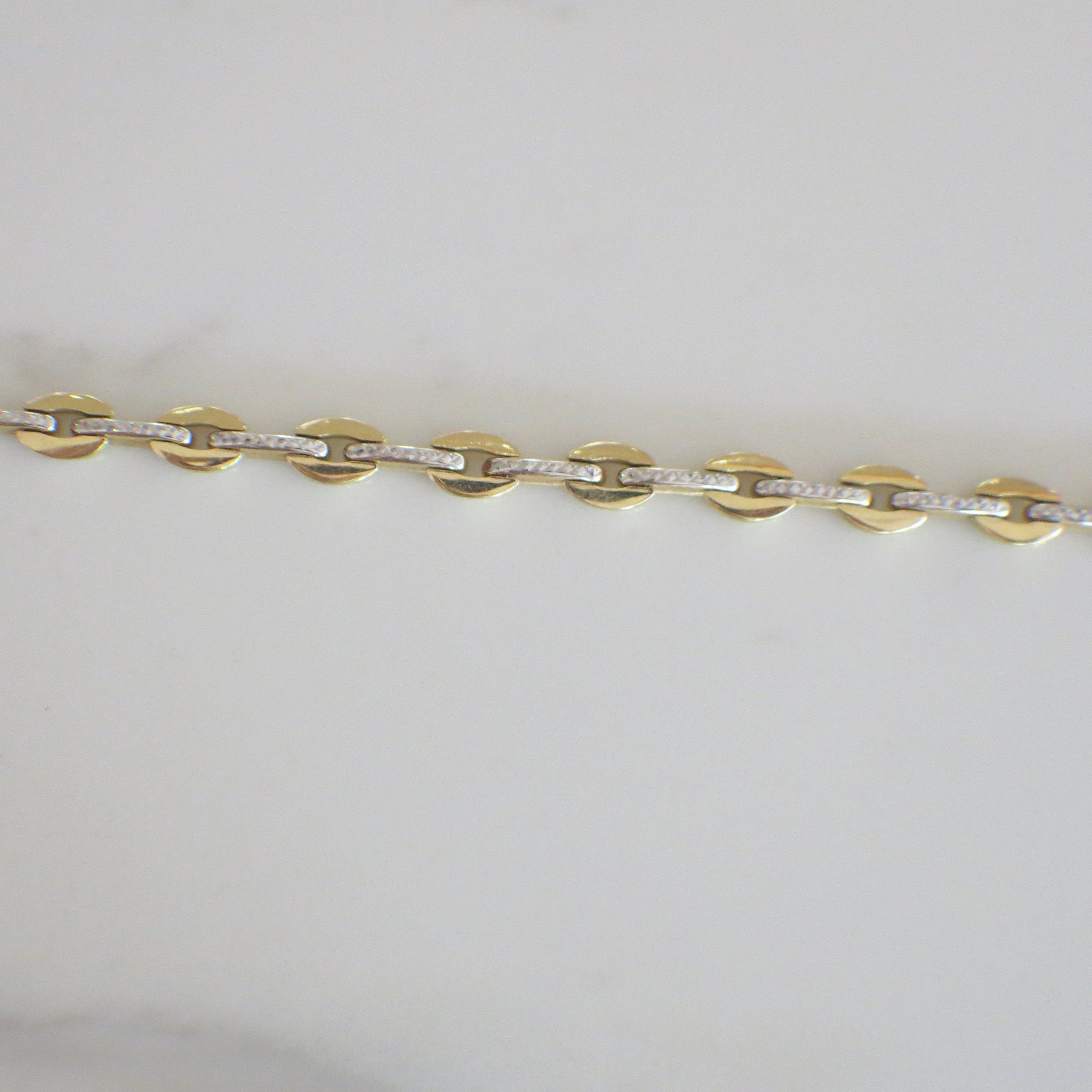 14K Two-Tone Oval Link Bracelet | Yellow & White Gold 7.25 Inch | Textured Center 9.9g - Black Market LLC