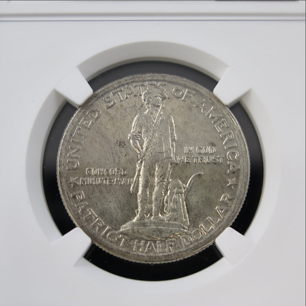 1925 Lexington-Concord Sesquicentennial Half Dollar silver commemorative coin, NGC MS64 grade, featuring historic imagery.