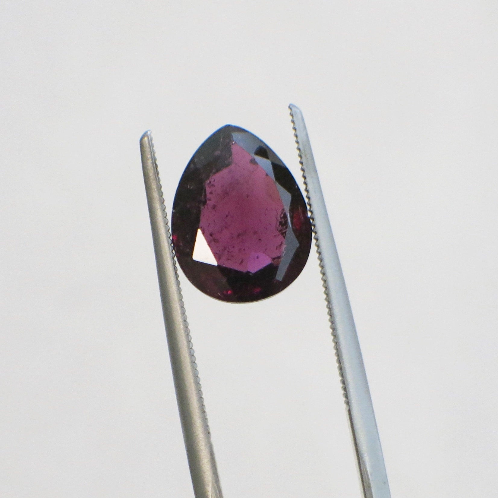 Pear cut Rhodolite garnet loose gemstone, 2.93 carats, 10x8mm, purplish-red color, from Black Market LLC.