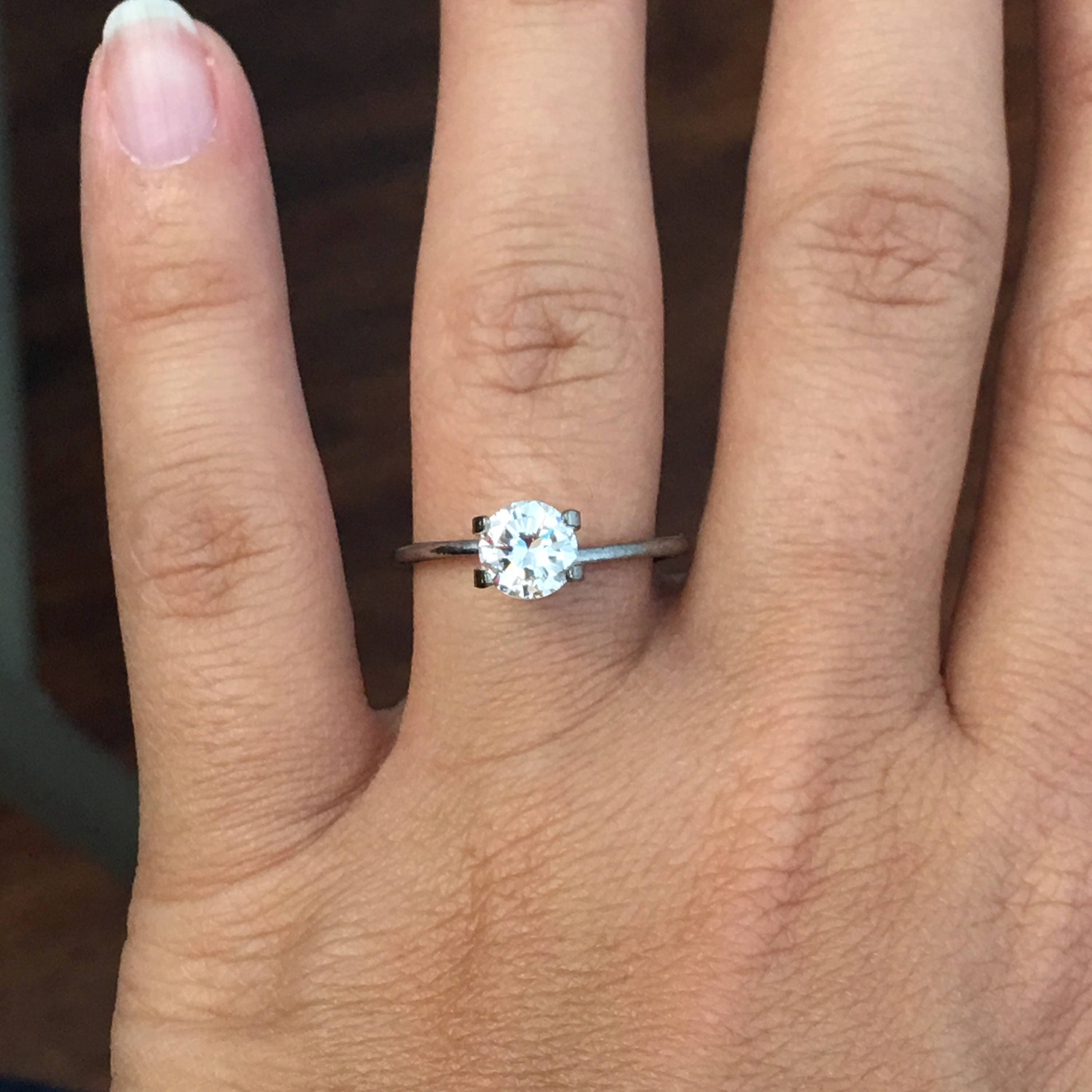 GIA Certified 0.88 CTW round brilliant diamond loose stone in E color, SI1 clarity, from Black Market LLC.