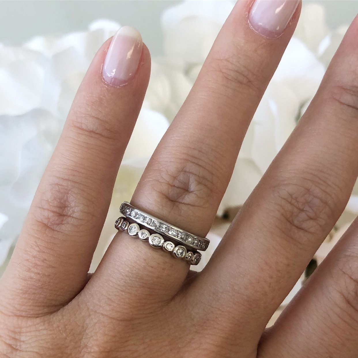 14K white gold diamond bezel eternity band, stackable wedding ring with sparkling diamonds, size 5.5, by Black Market LLC.