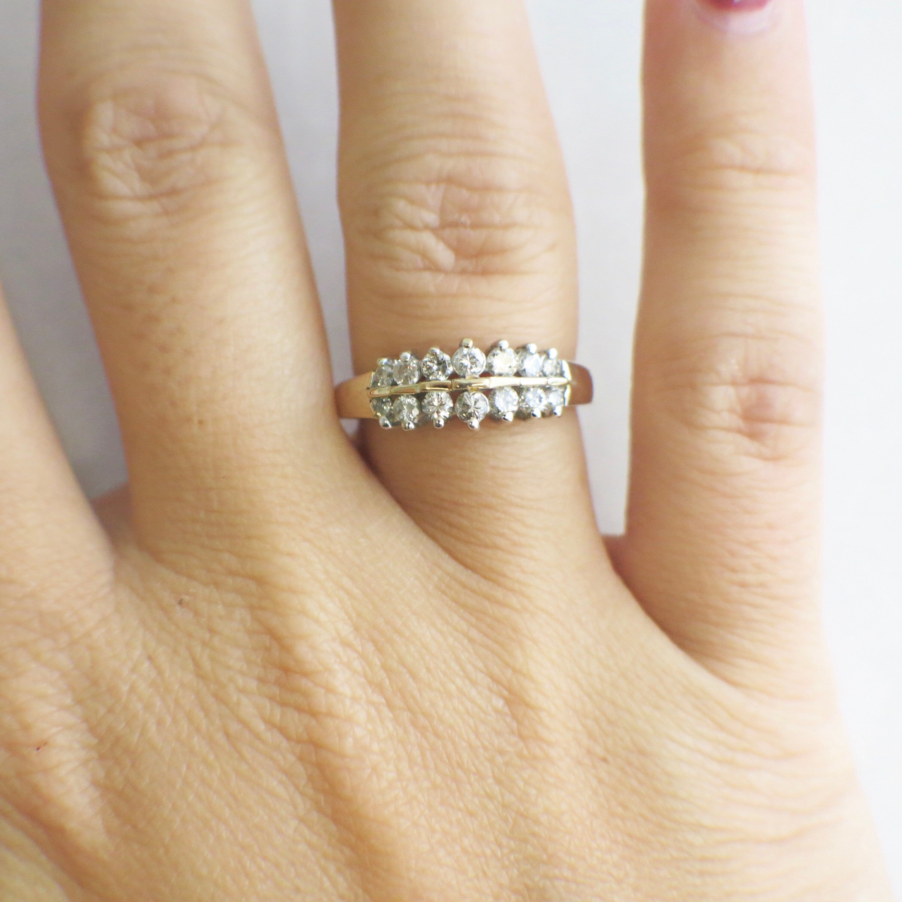 Vintage 14K yellow gold diamond double row ring with graduated band and .36 CTW, size 6.5, from Black Market LLC.