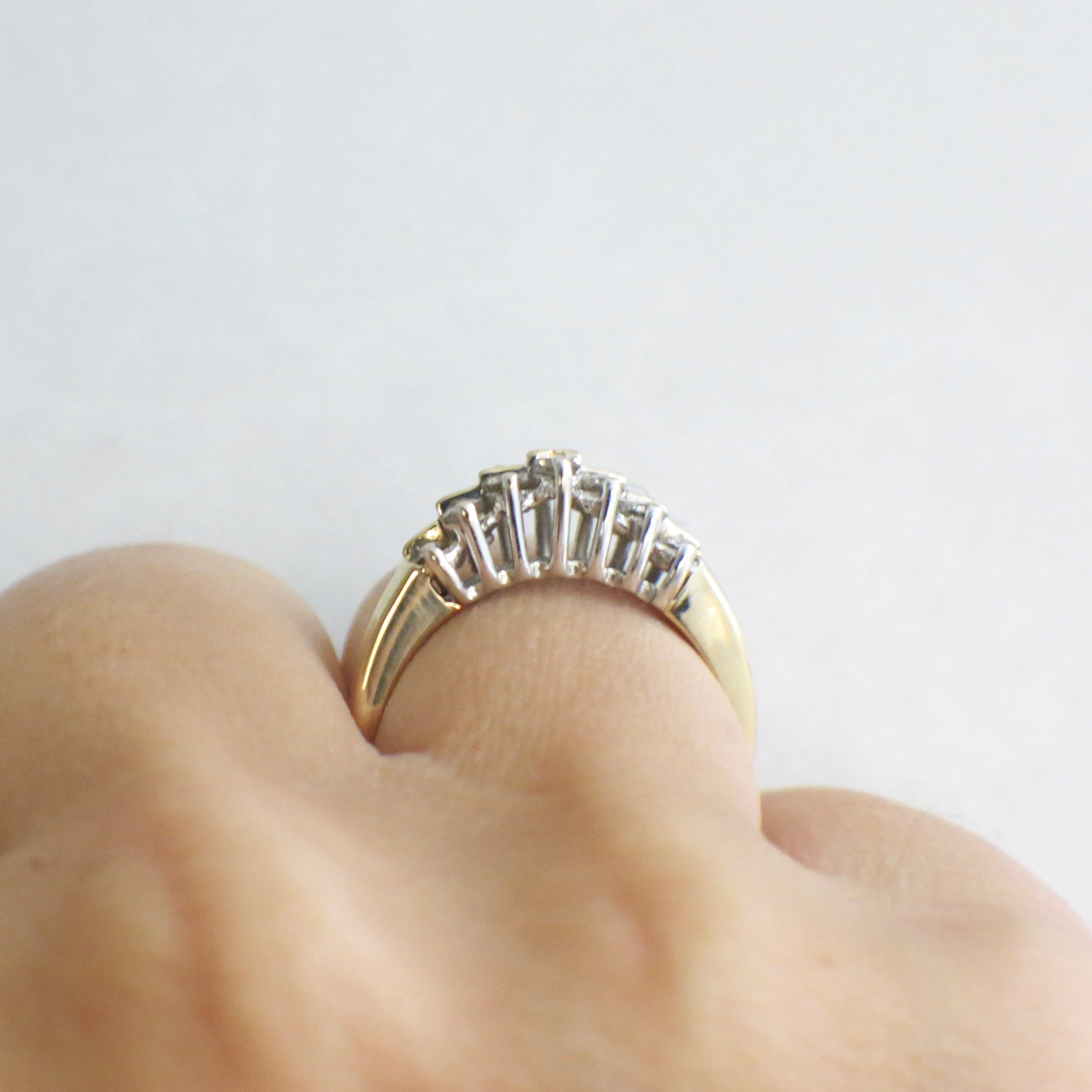 Vintage 14K yellow gold diamond double row ring with graduated band and 0.36 CTW, size 6.5, featuring sparkling diamonds.