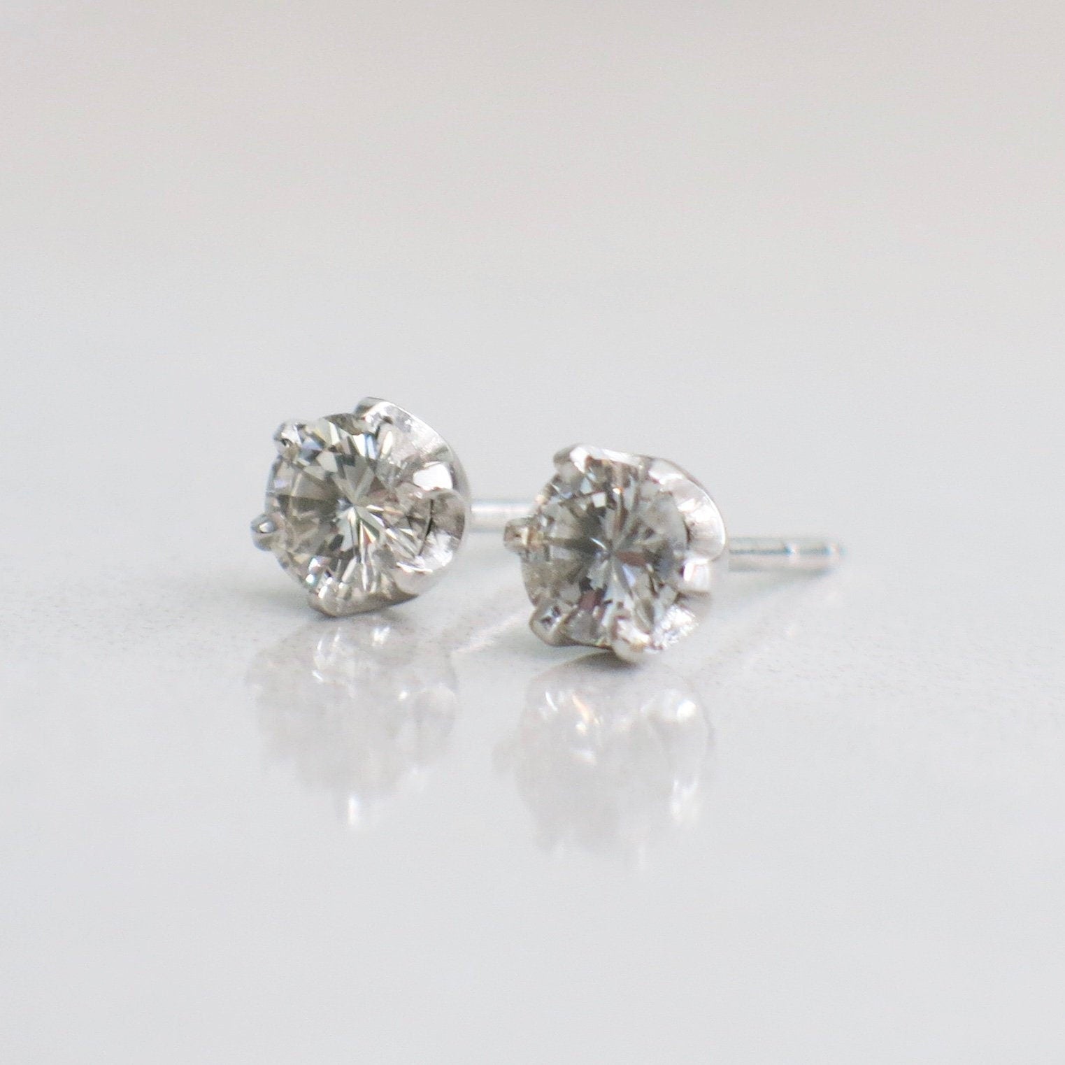 0.68ct Diamond Stud Earrings | 14K White Gold Round Brilliant - Black Market LLC