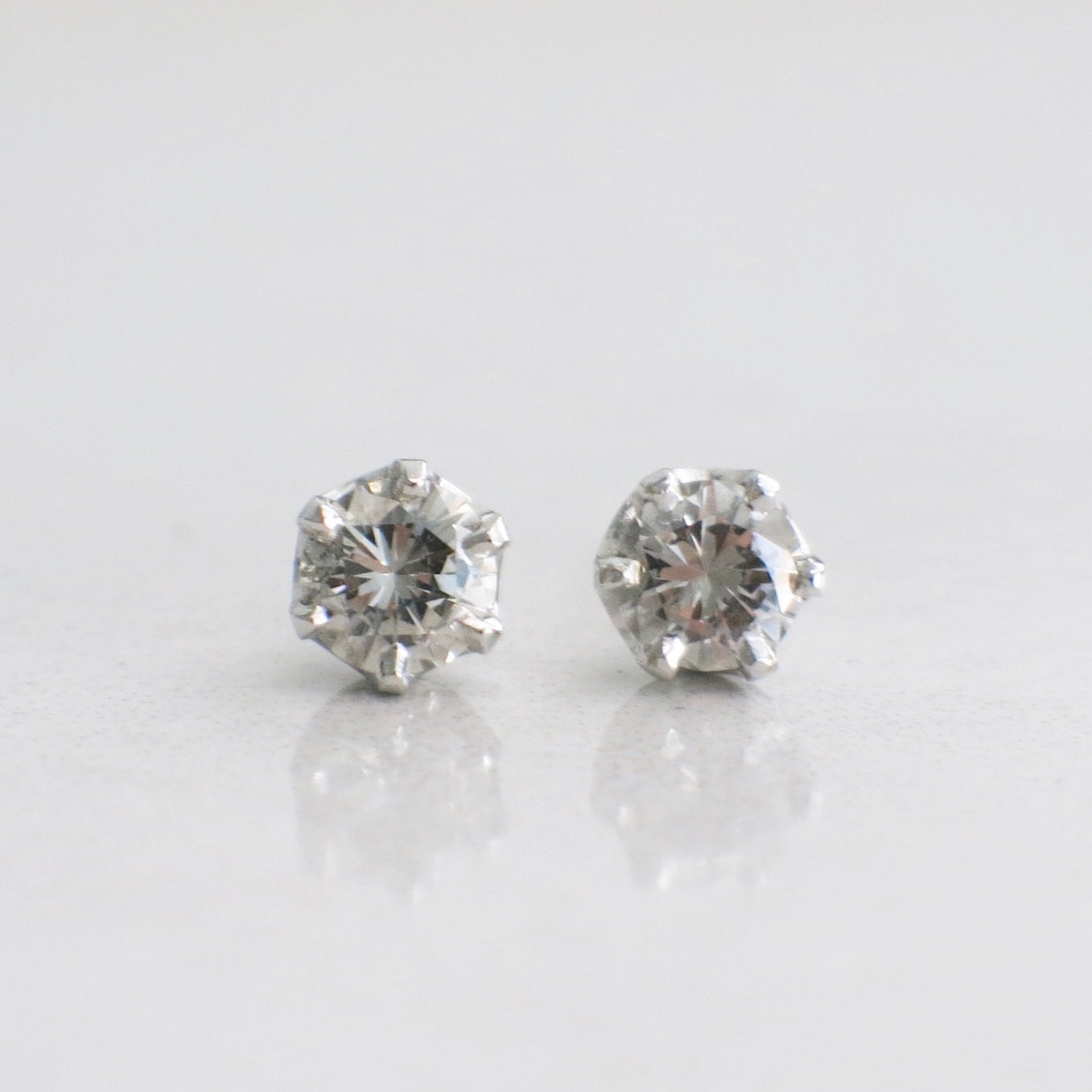 0.68ct Diamond Stud Earrings | 14K White Gold Round Brilliant - Black Market LLC