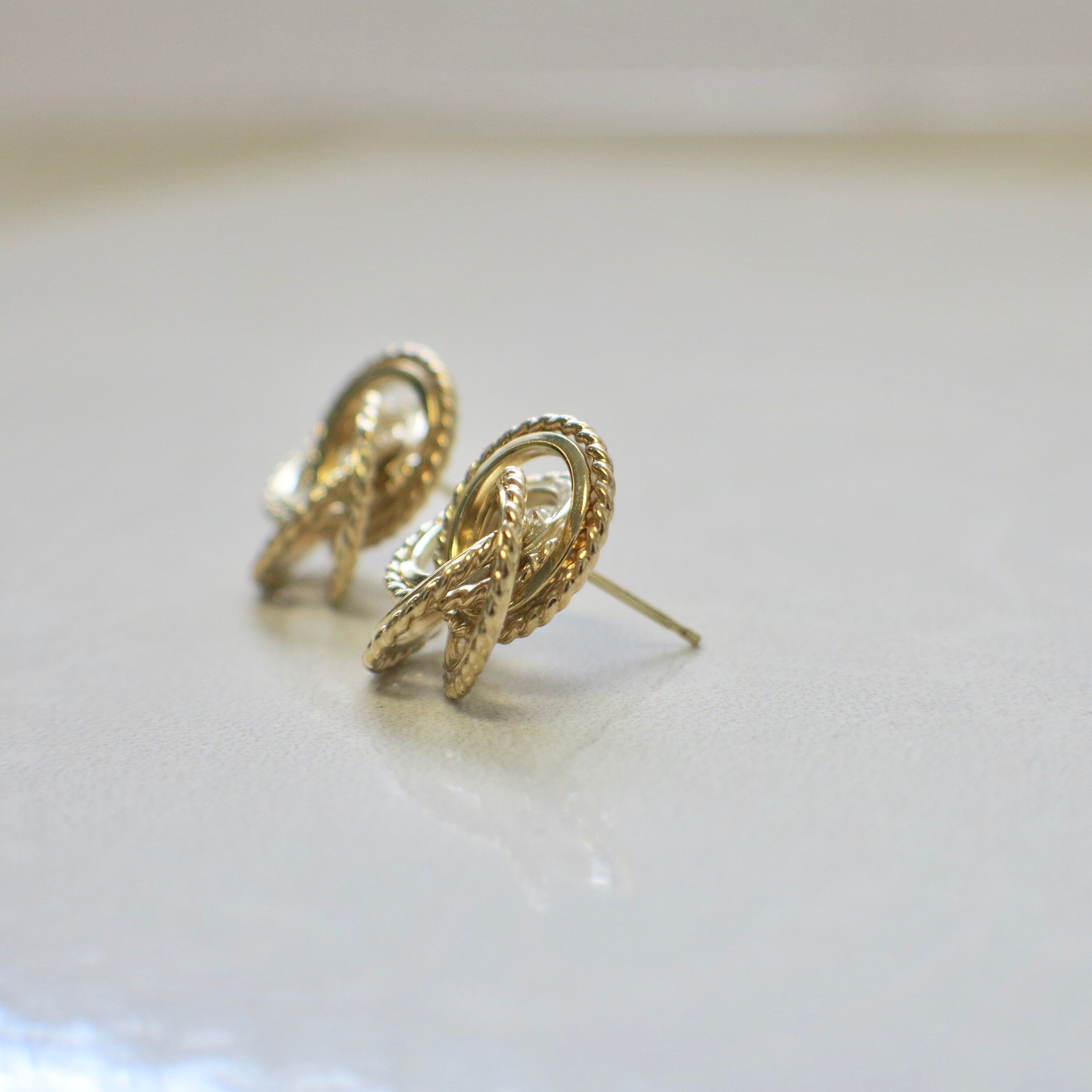 14K Yellow Gold Floral Twist Braid Stud Earrings - Black Market LLC