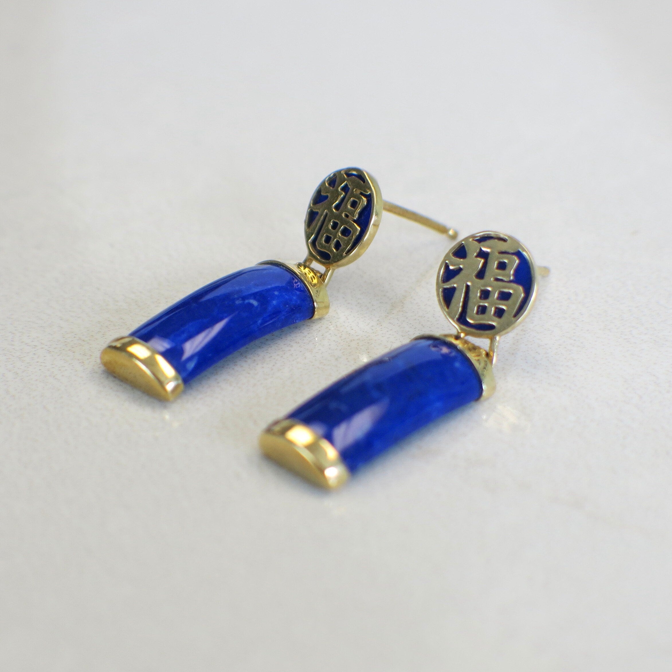 14K yellow gold lapis lazuli earrings with vintage dangle design and Chinese symbol accents by Black Market LLC