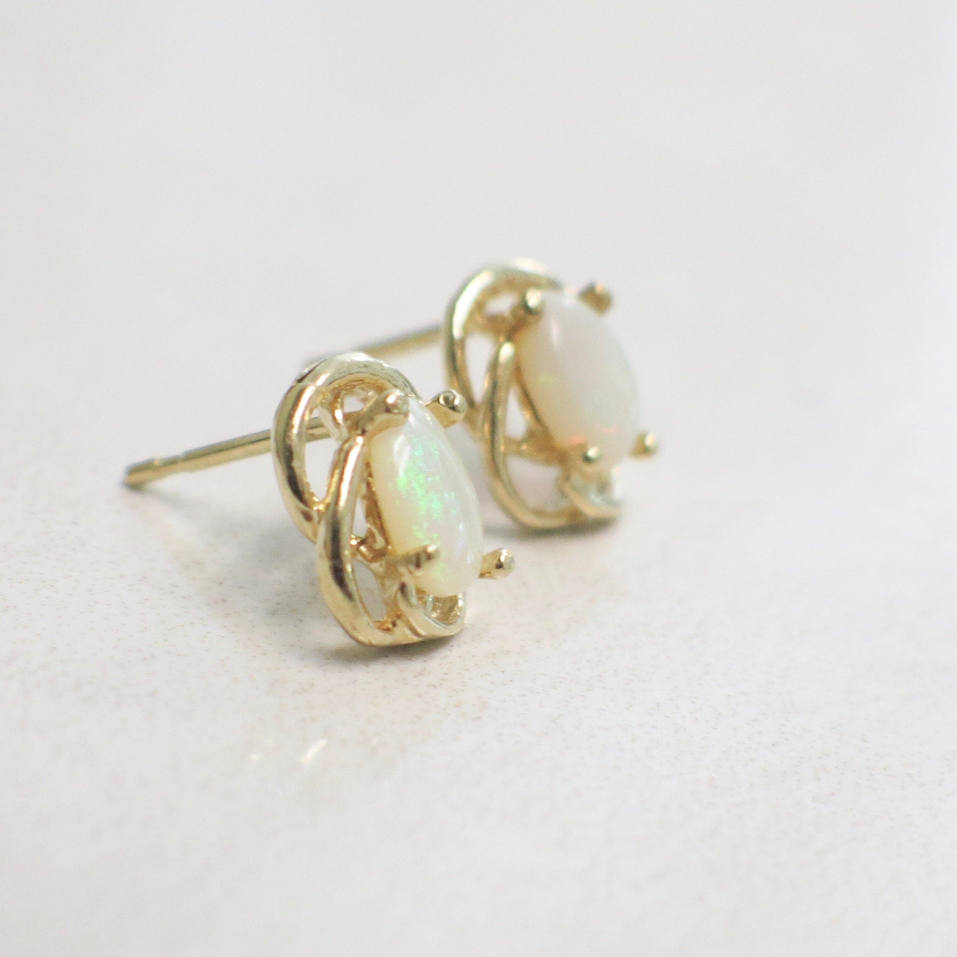 14K Yellow Gold White Opal Stud Earrings | Vintage Oval Cabochon Twist Design - Black Market LLC