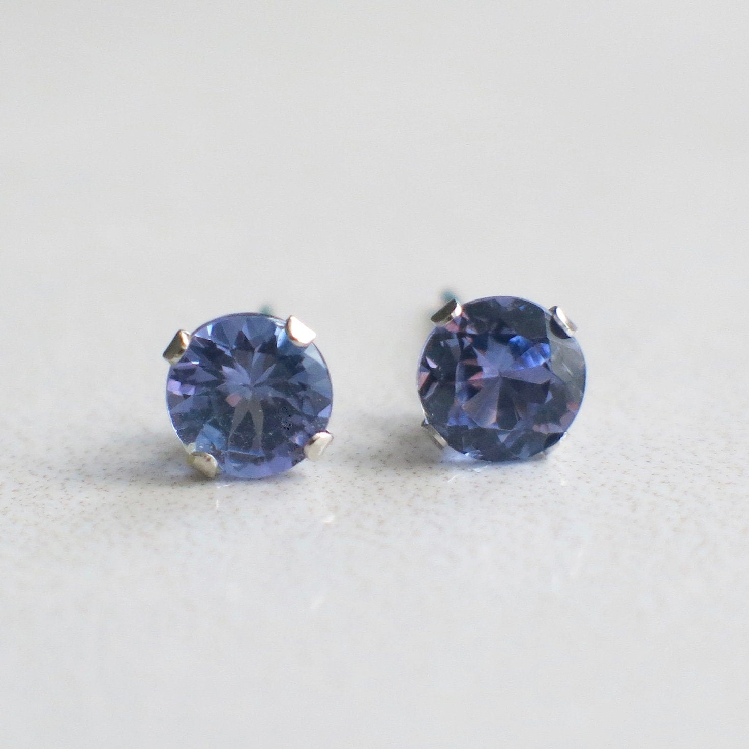 Tanzanite Stud Earrings – 14K White Gold, 5 mm Round - Black Market LLC