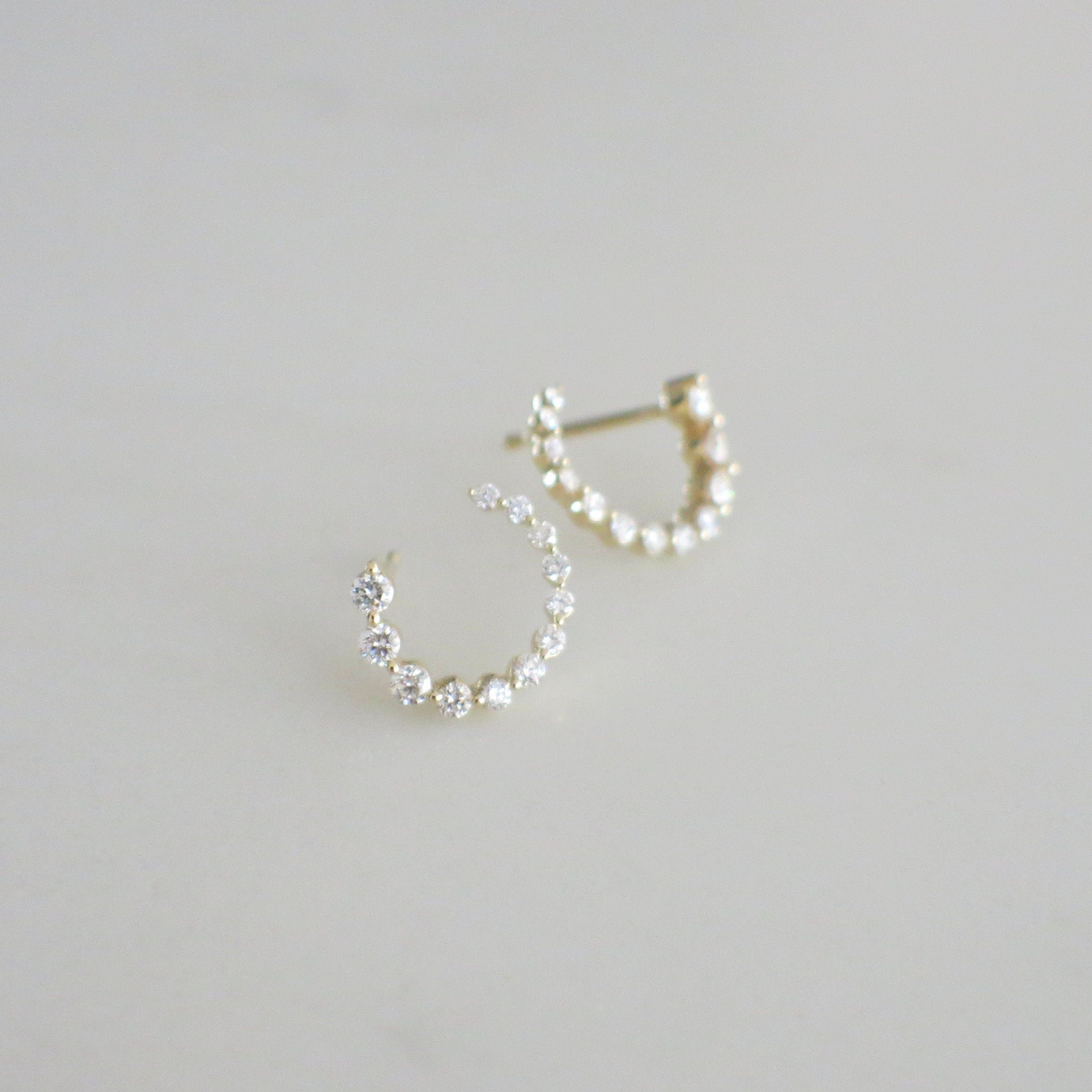 14K gold diamond hoop earrings by Black Market LLC, rose gold dangle hoops with front-to-back design in yellow, white, or rose gold.