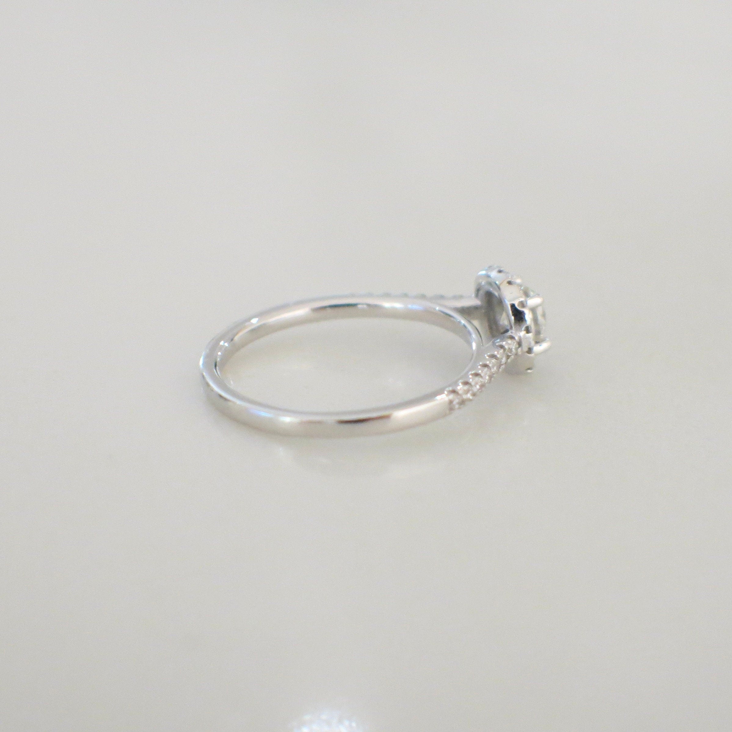 14K white gold diamond halo engagement ring with round brilliant diamonds, petite bridal design, 0.58 ct tw, size 5.25.