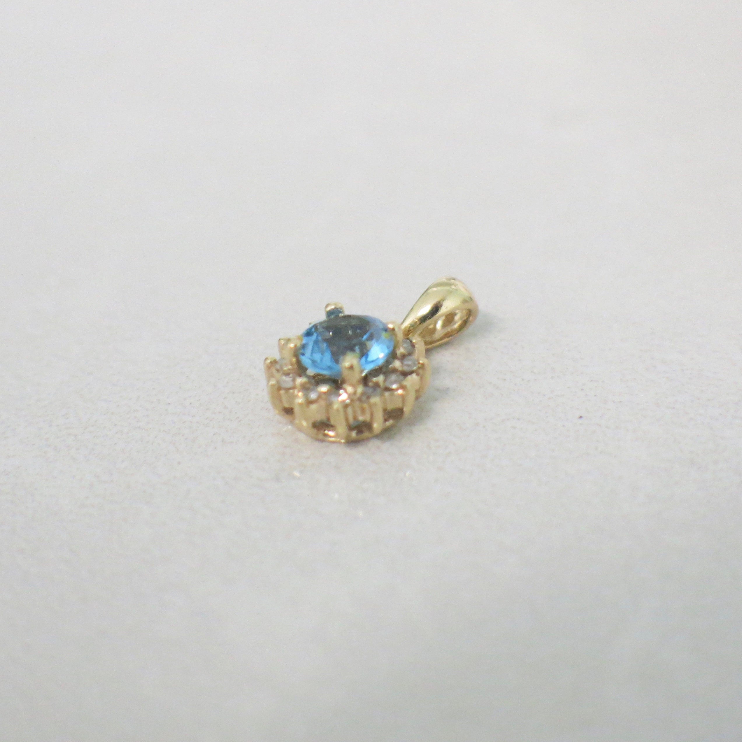 10K Yellow Gold Swiss Blue Topaz Diamond Halo Pendant – Round - Black Market LLC