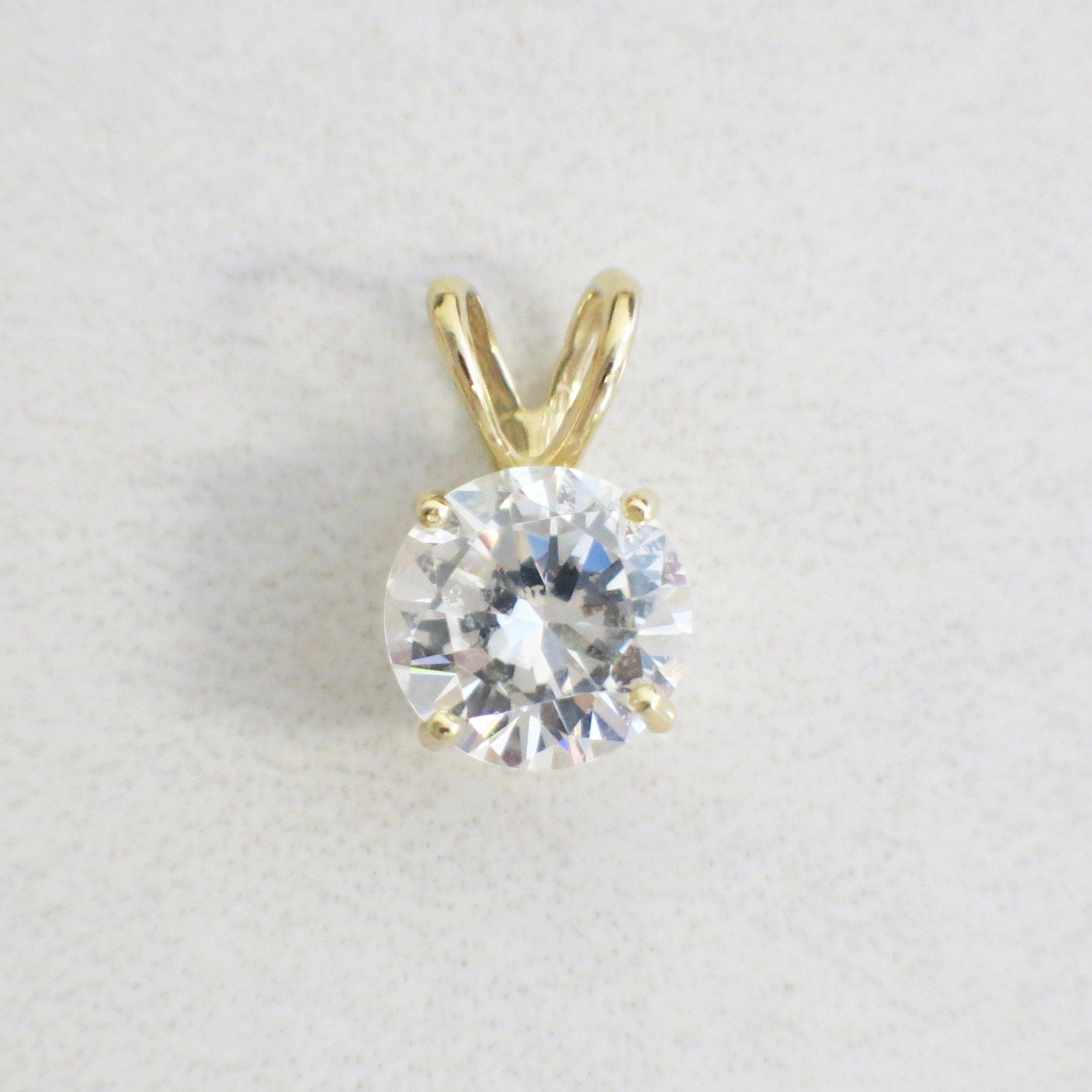 14K yellow gold round CZ solitaire pendant on vintage necklace charm, 8mm, crafted by Black Market LLC.