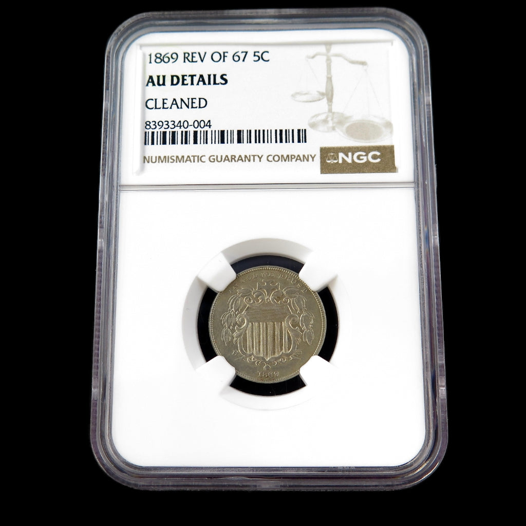 1869 Shield Nickel reverse showing intricate design and details, an early U.S. five-cent coin graded AU details by NGC.