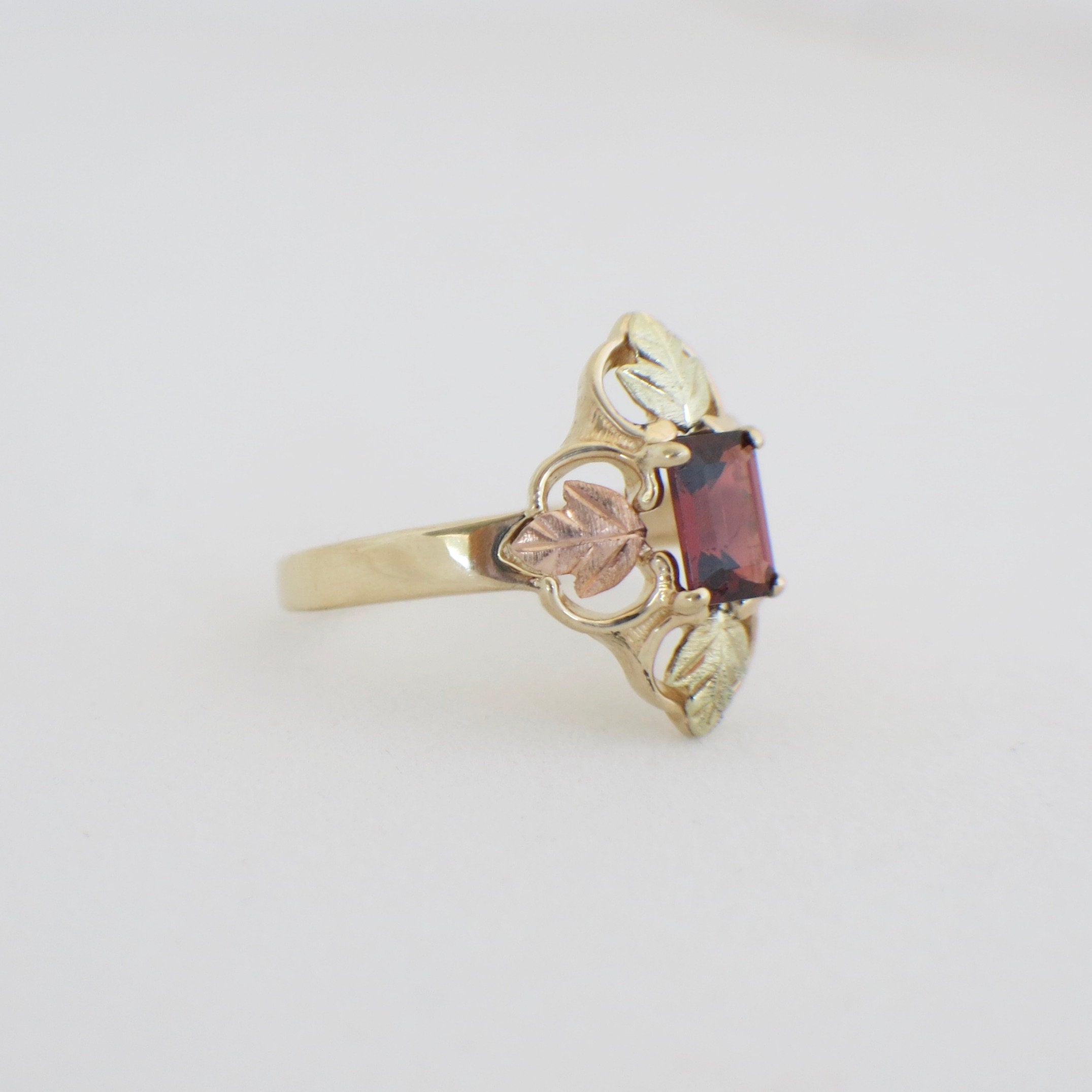10K Gold Garnet Leaf Ring | Vintage Emerald Cut Garnet with Rose & Yellow Gold Leaves Size 7 - Black Market LLC