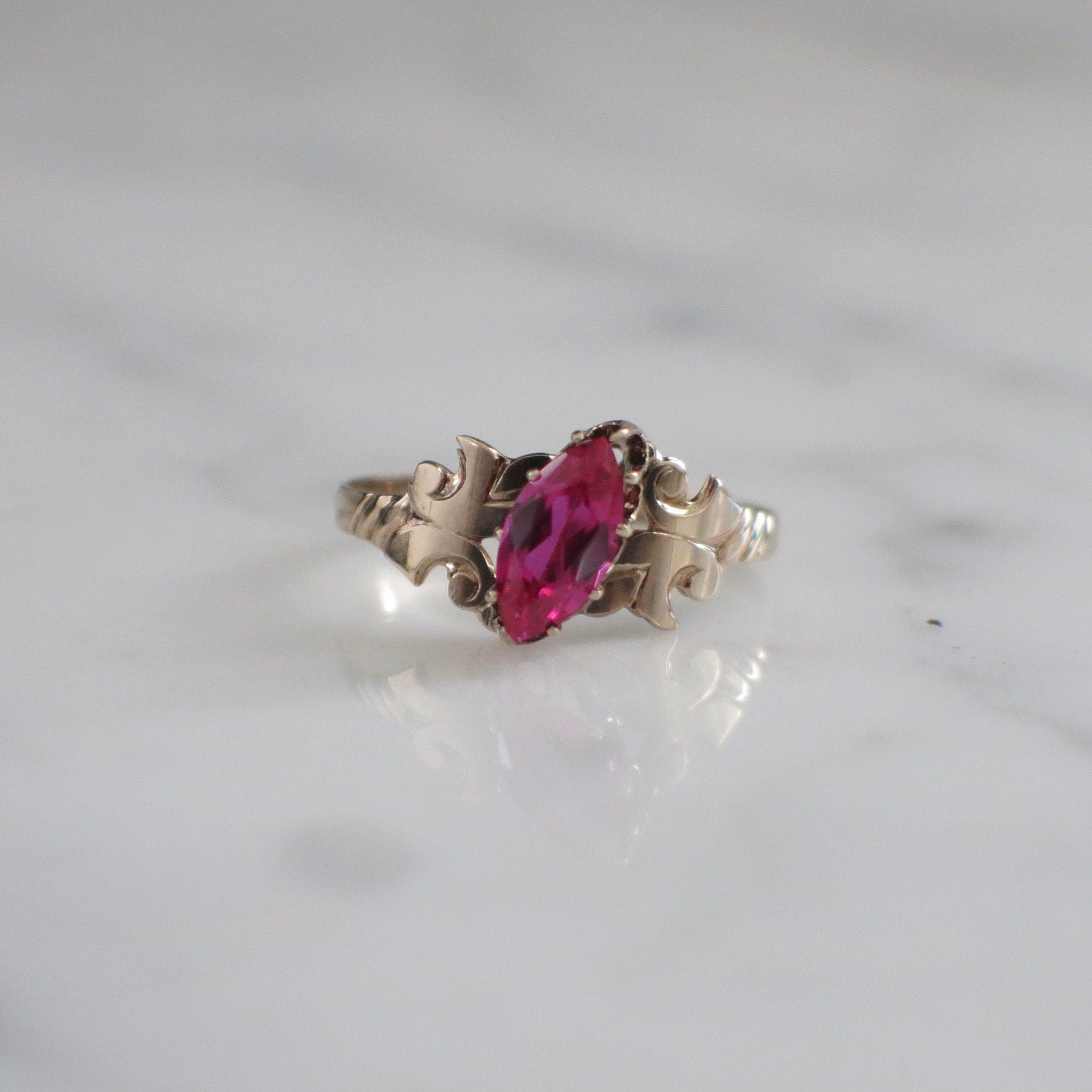 10K Yellow Gold Pink Sapphire Ring | Marquise Synthetic Gemstone Size 5.25 - Black Market LLC