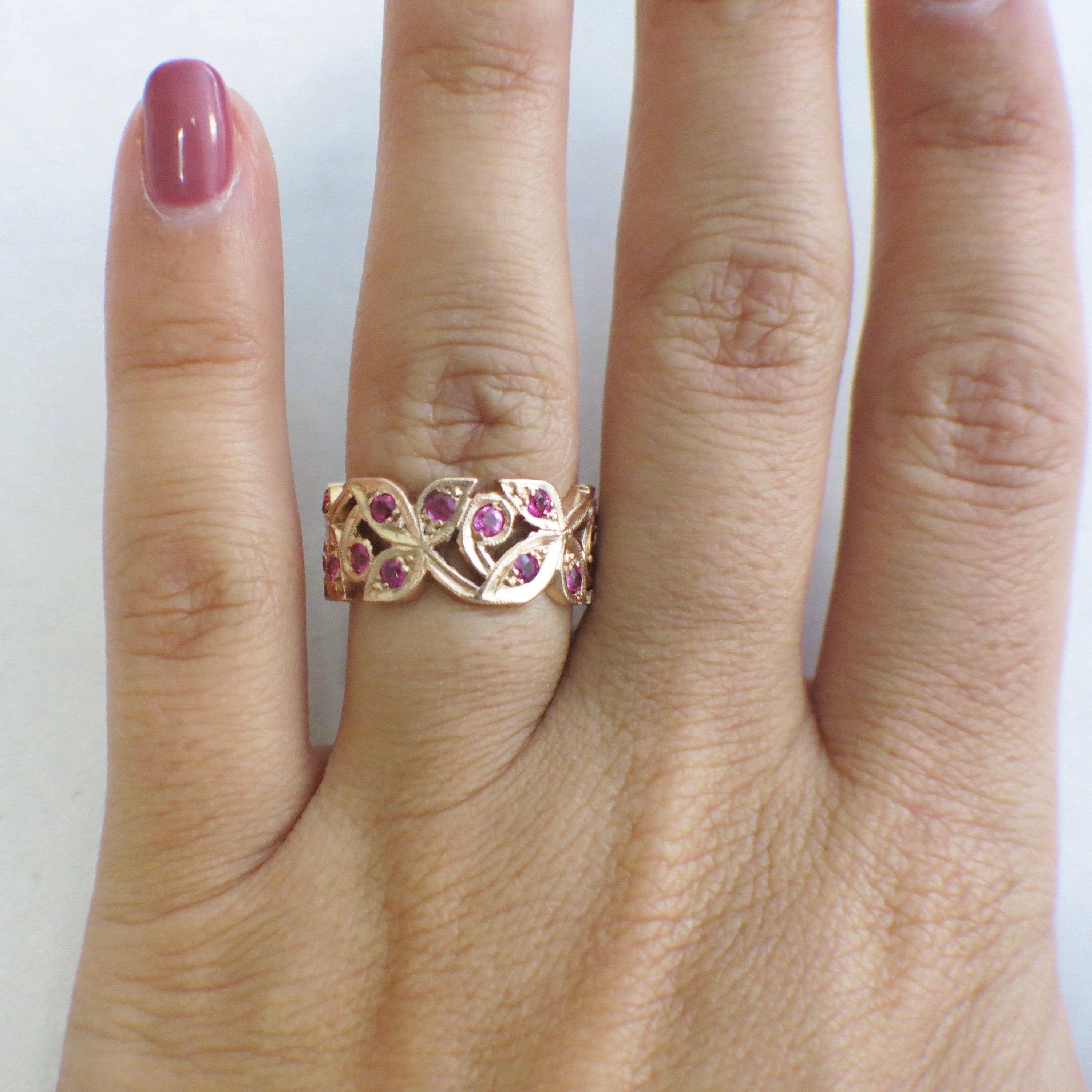 14K rose gold leaf band ring with pink sapphires, floral milgrain detail, size 6.5, by Black Market LLC.